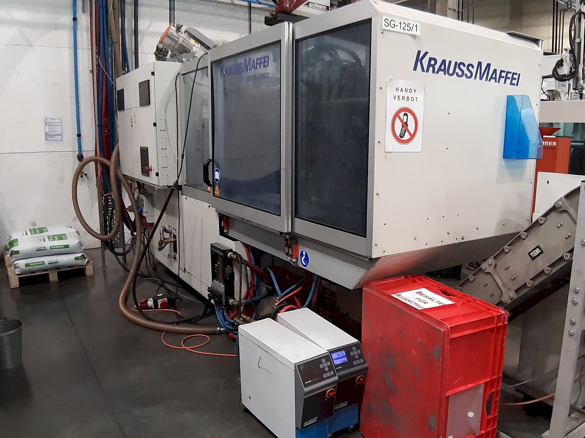 Makine Krauss Maffei 125 - 390 CX - Önden görünüm
