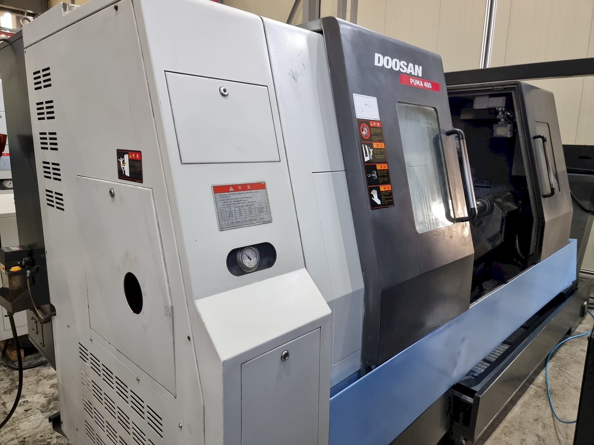 Makine Doosan PUMA 400B - Önden görünüm