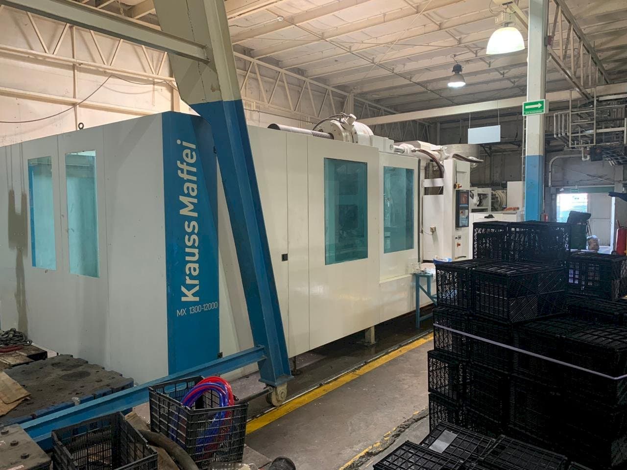 Makine Krauss Maffei 1300-12000 MX - Önden görünüm