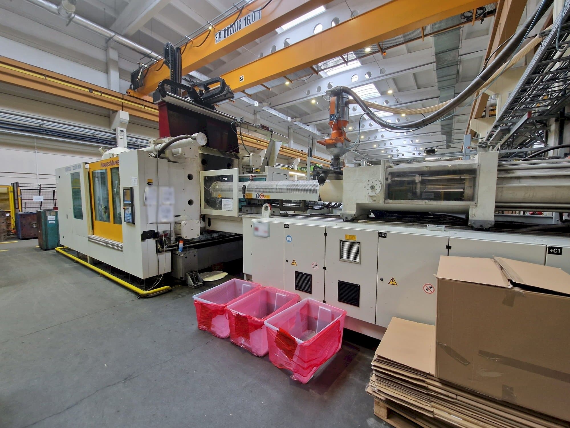 Makine  Krauss Maffei 1100-12000 MX - Önden görünüm