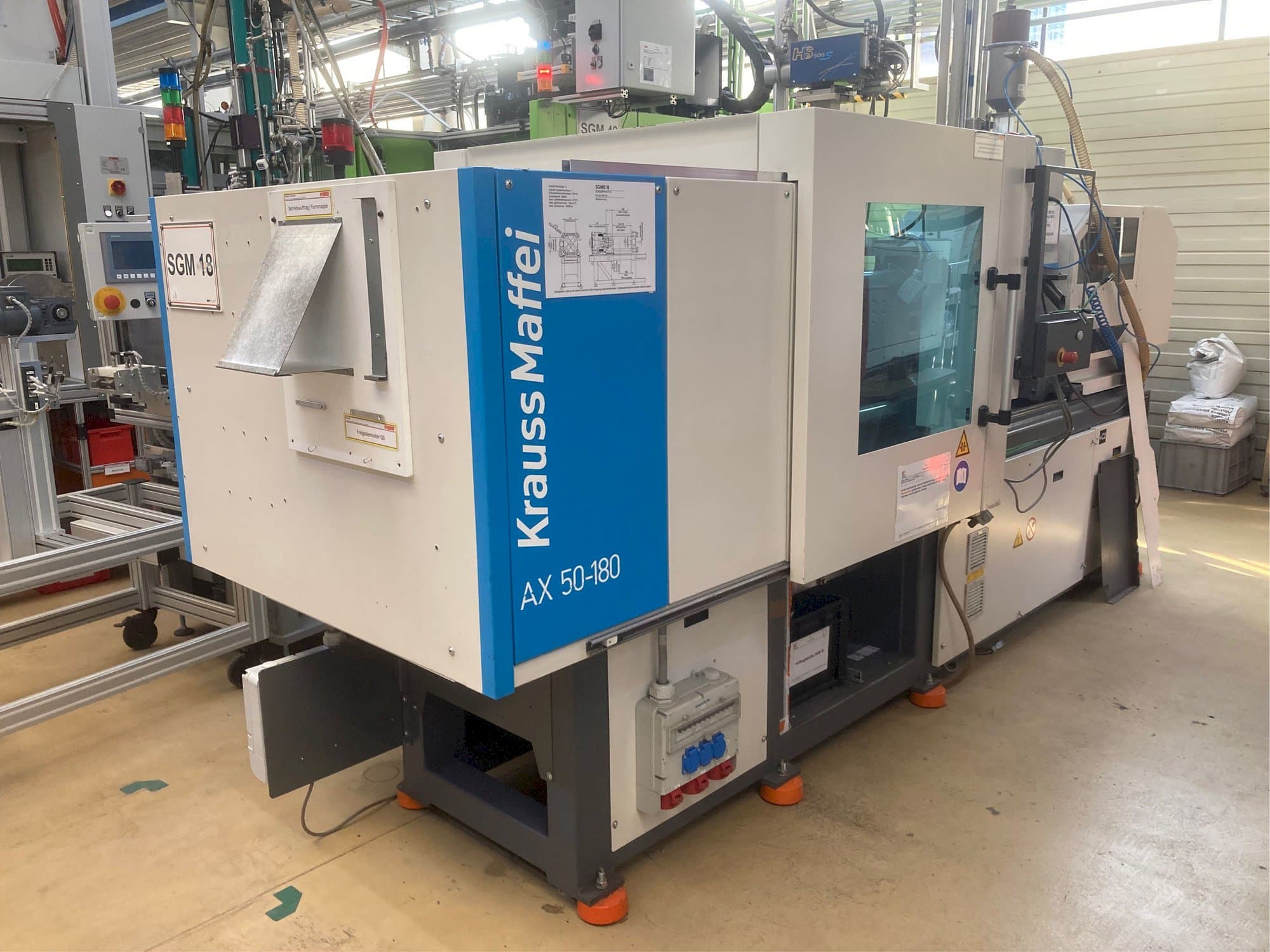 Makine Krauss Maffei AX 50-180 - Sol taraftaki görüntü