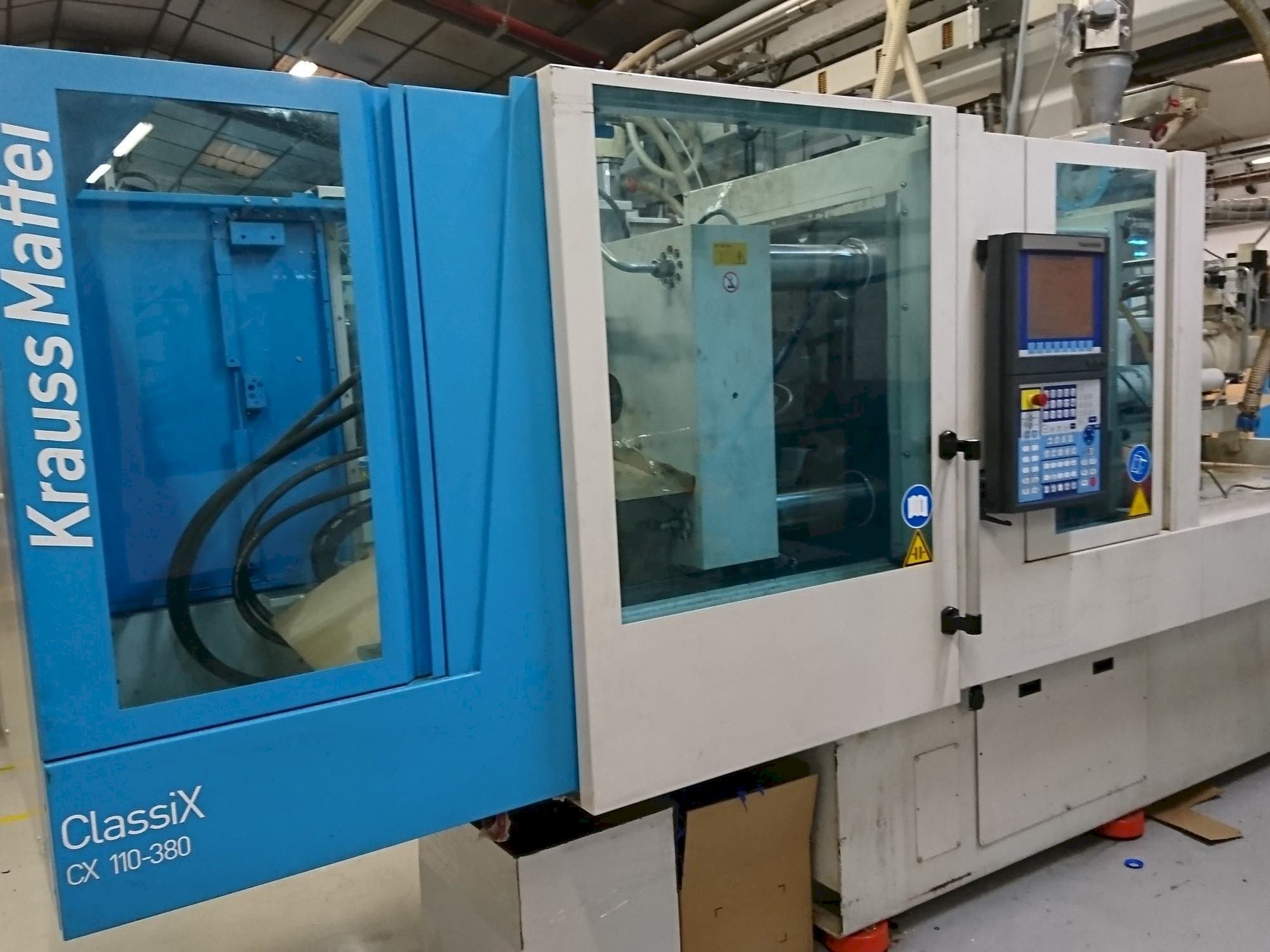 Makine  Krauss Maffei 110-380 CX - Önden görünüm