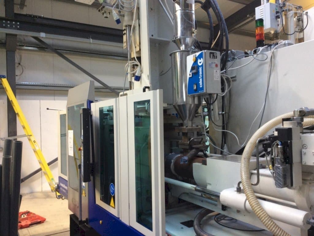 Makine Krauss Maffei 80-180-55 CX V - Önden görünüm