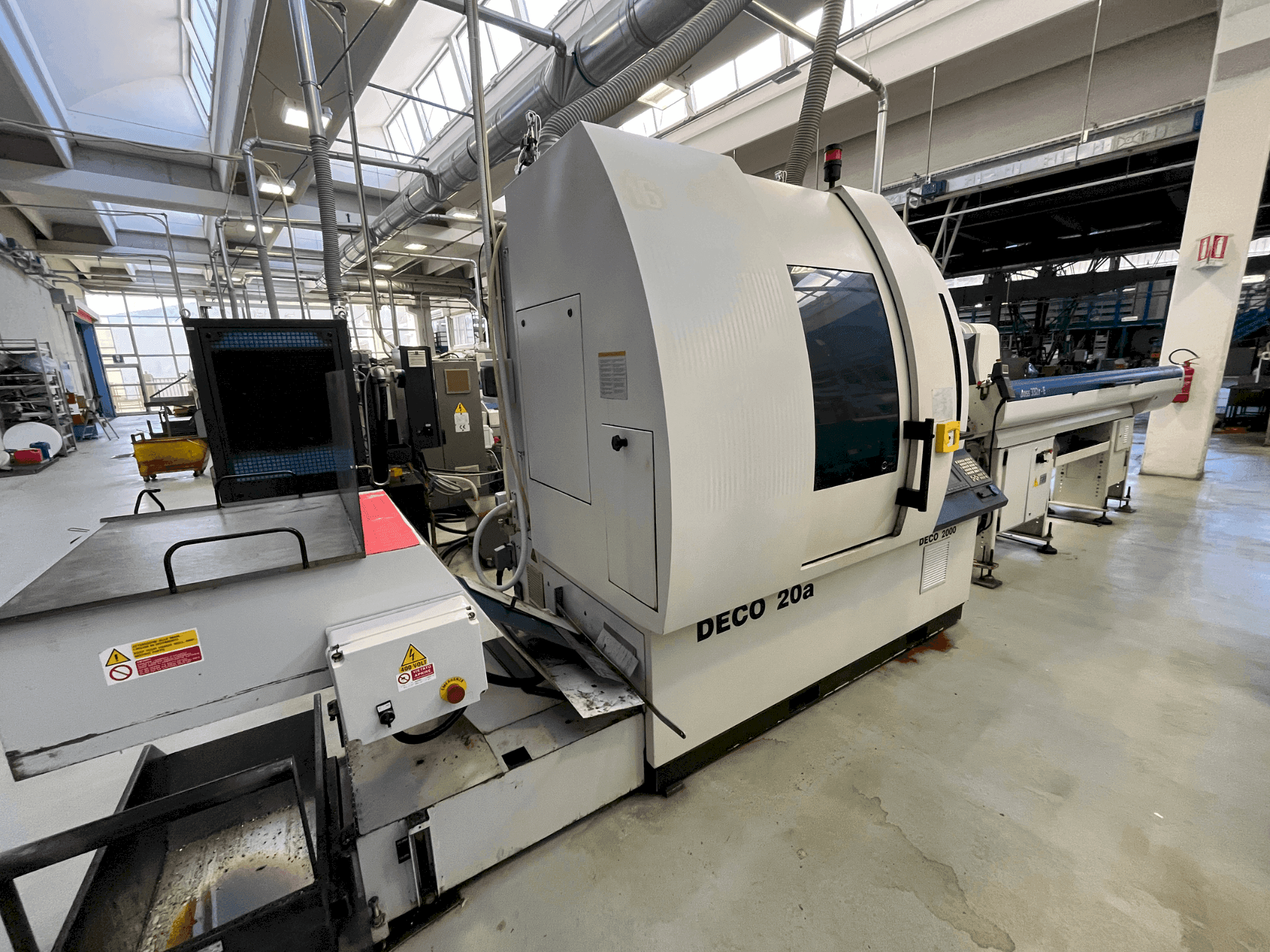 Makine TORNOS DECO 20A - Önden görünüm