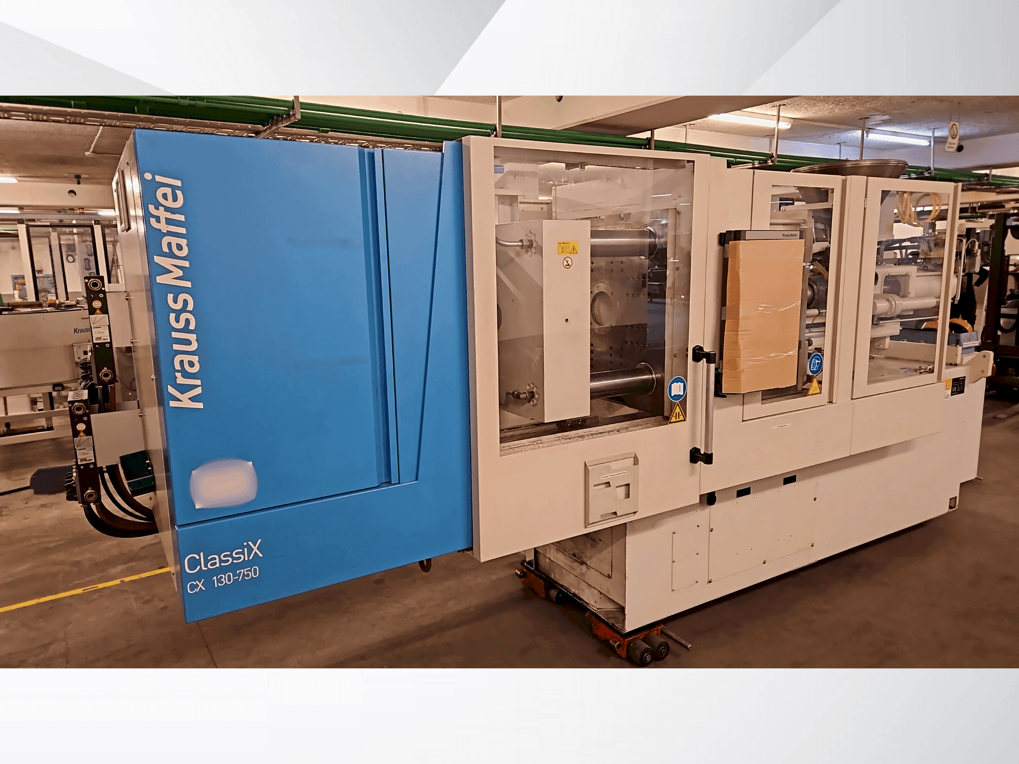 Makine Krauss Maffei 130-750 CX - Önden görünüm