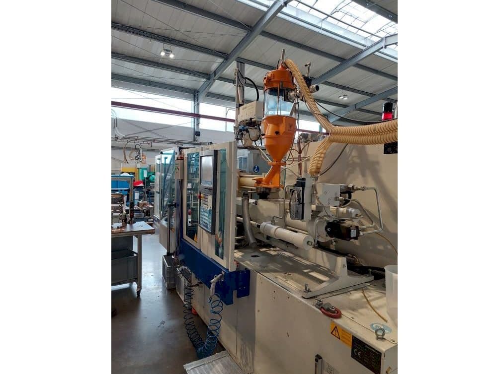 Makine Krauss Maffei 80-180 CX - Önden görünüm