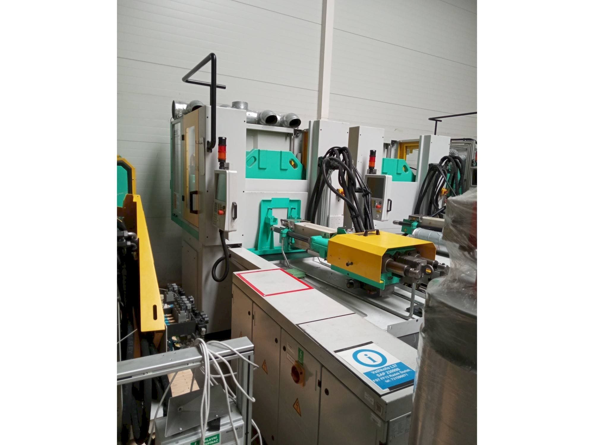 Makine  Arburg Allrounder 1200T-800-150 - Önden görünüm