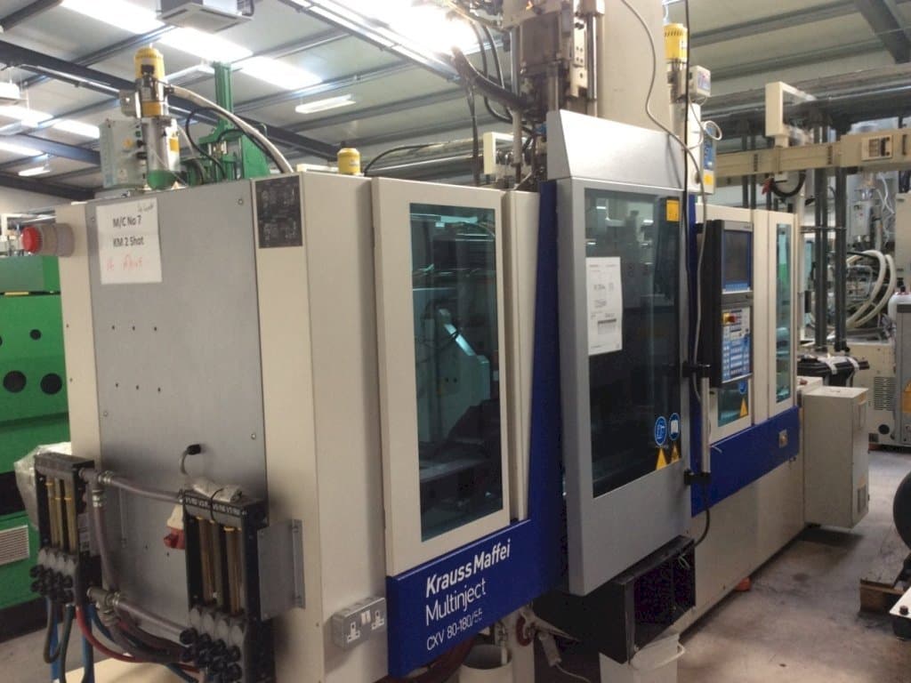 Makine Krauss Maffei Multinject 80-180-55 CX V - Önden görünüm