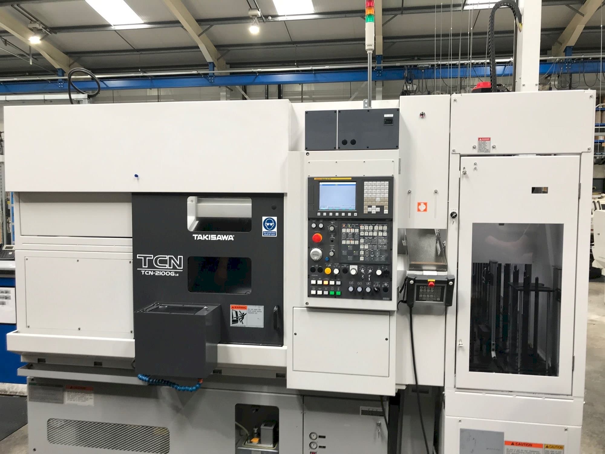 Makine  Takisawa TCN-2100G L6 - Önden görünüm