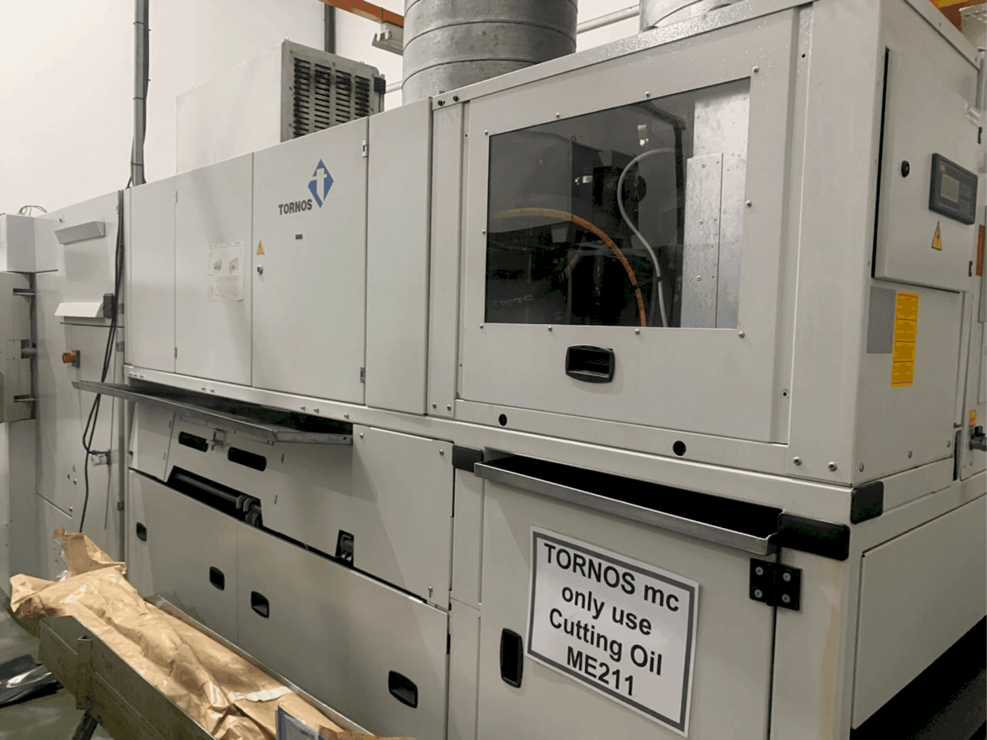 Makine  TORNOS MultiSWiss 6x14 - Önden görünüm