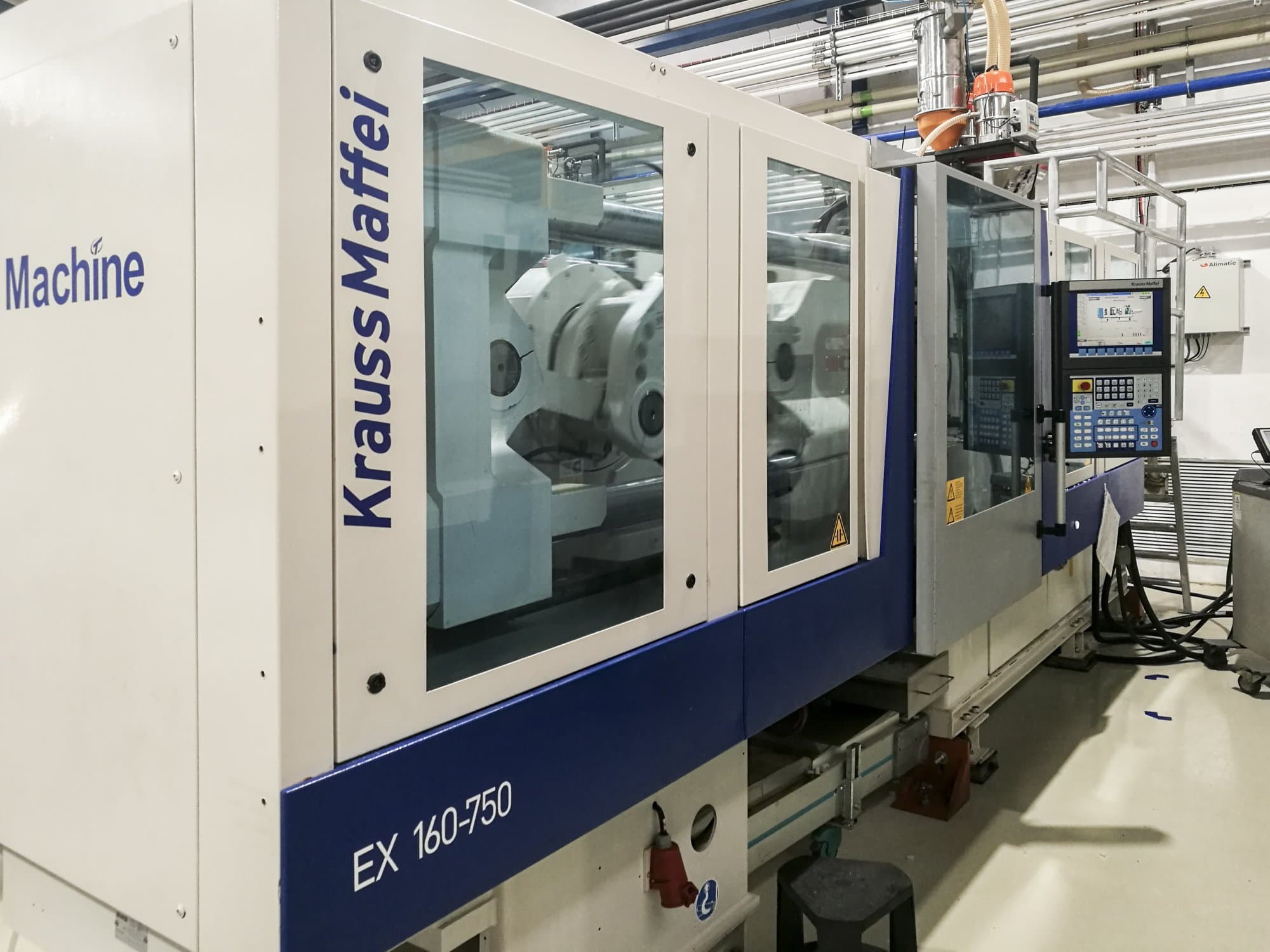 Makine  Krauss Maffei - Sol görünüm 160-750 EX