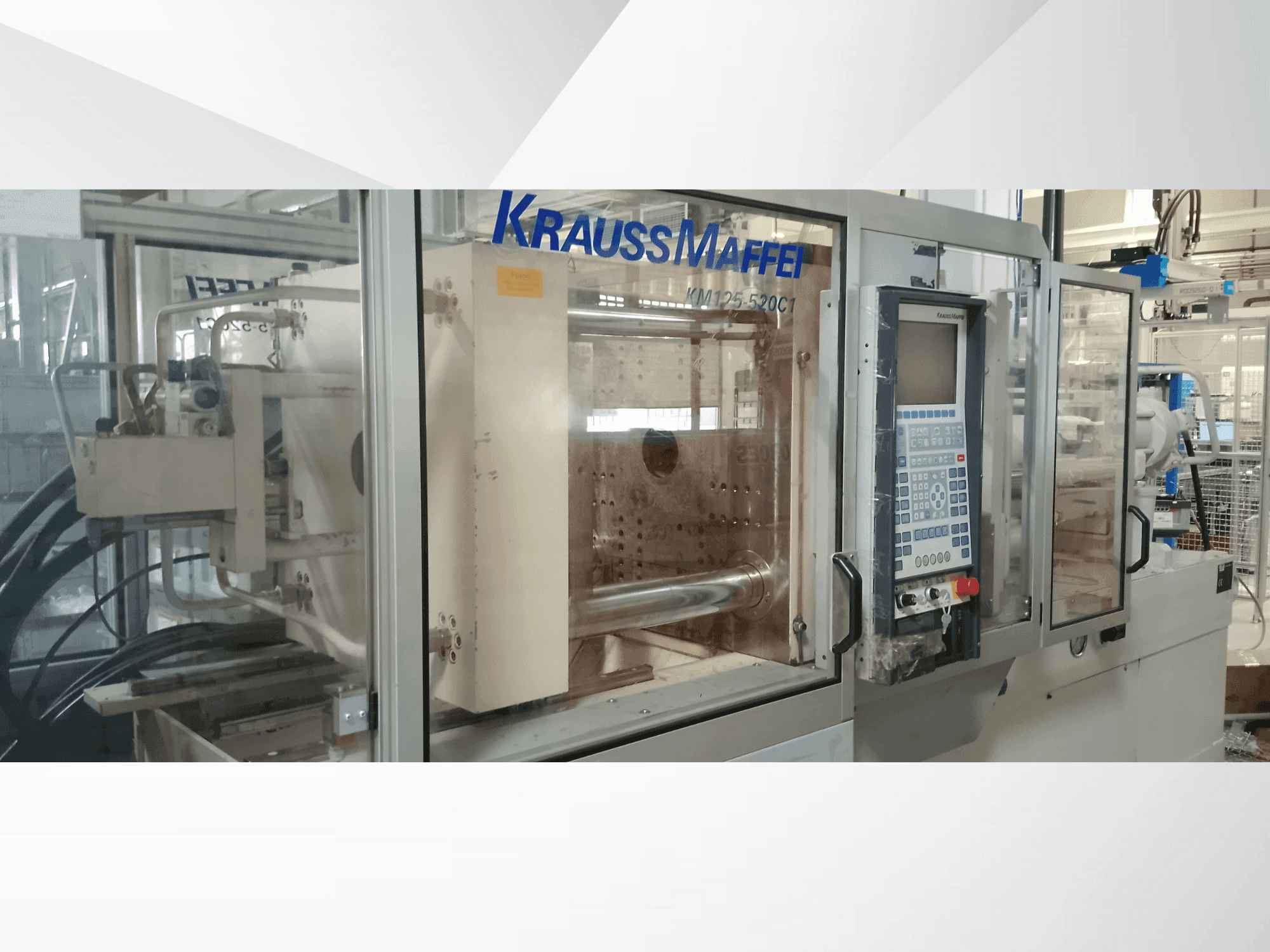 Makine Krauss Maffei 125-520 C1 - Önden görünüm