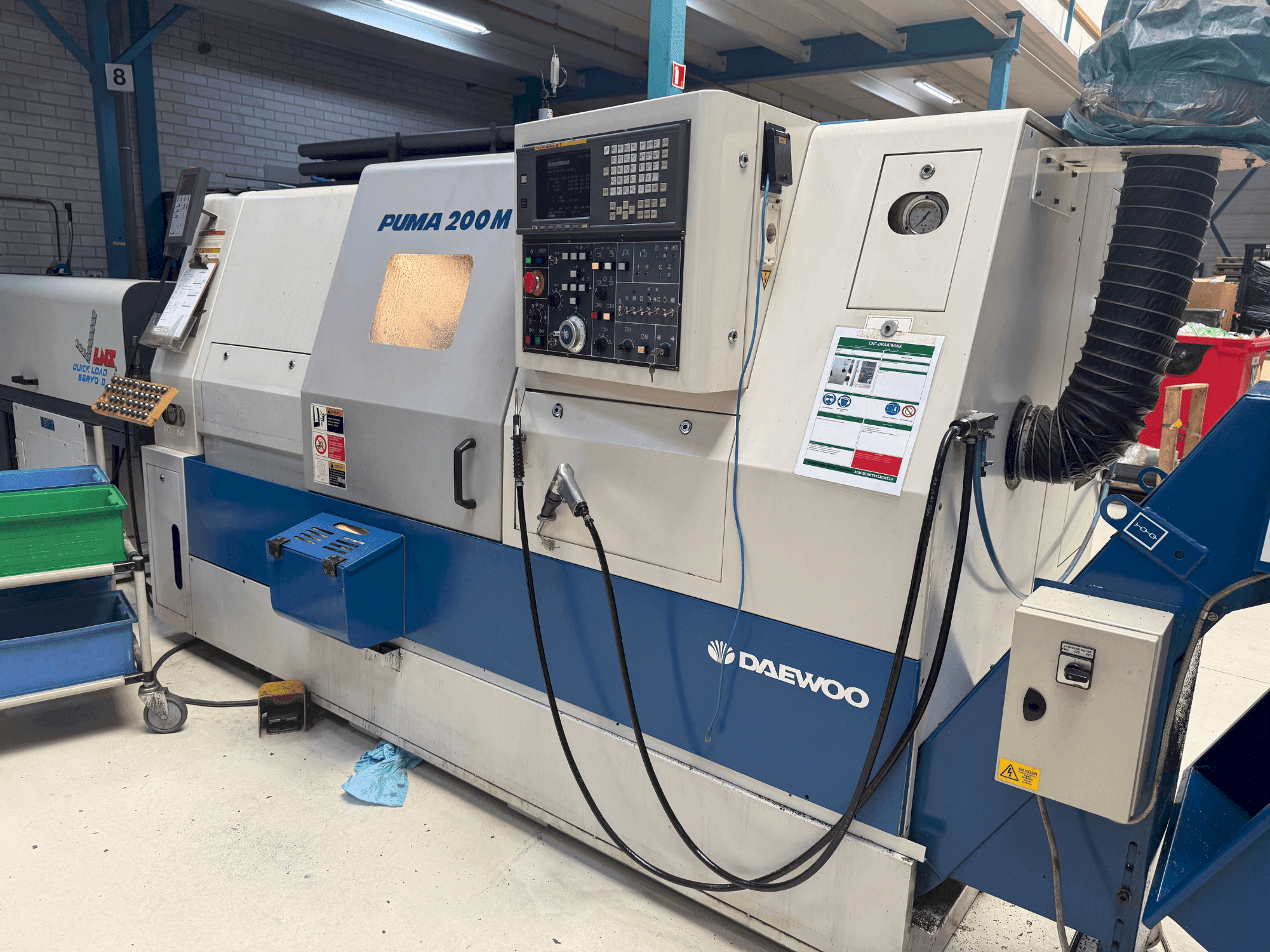 Makine DAEWOO Puma 200 LMC - Önden görünüm