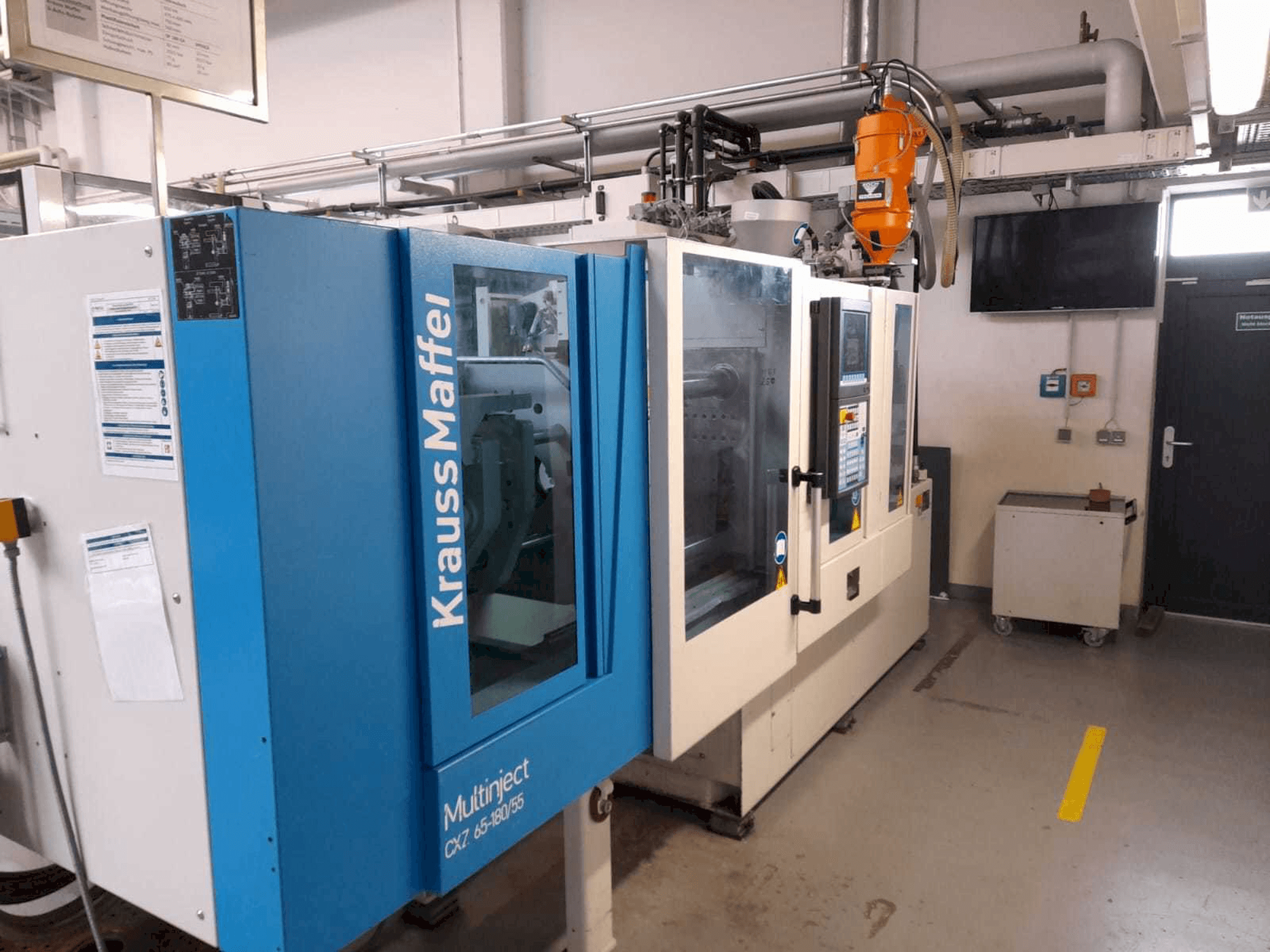 Makine Krauss Maffei KM 65/80 CX - Önden görünüm