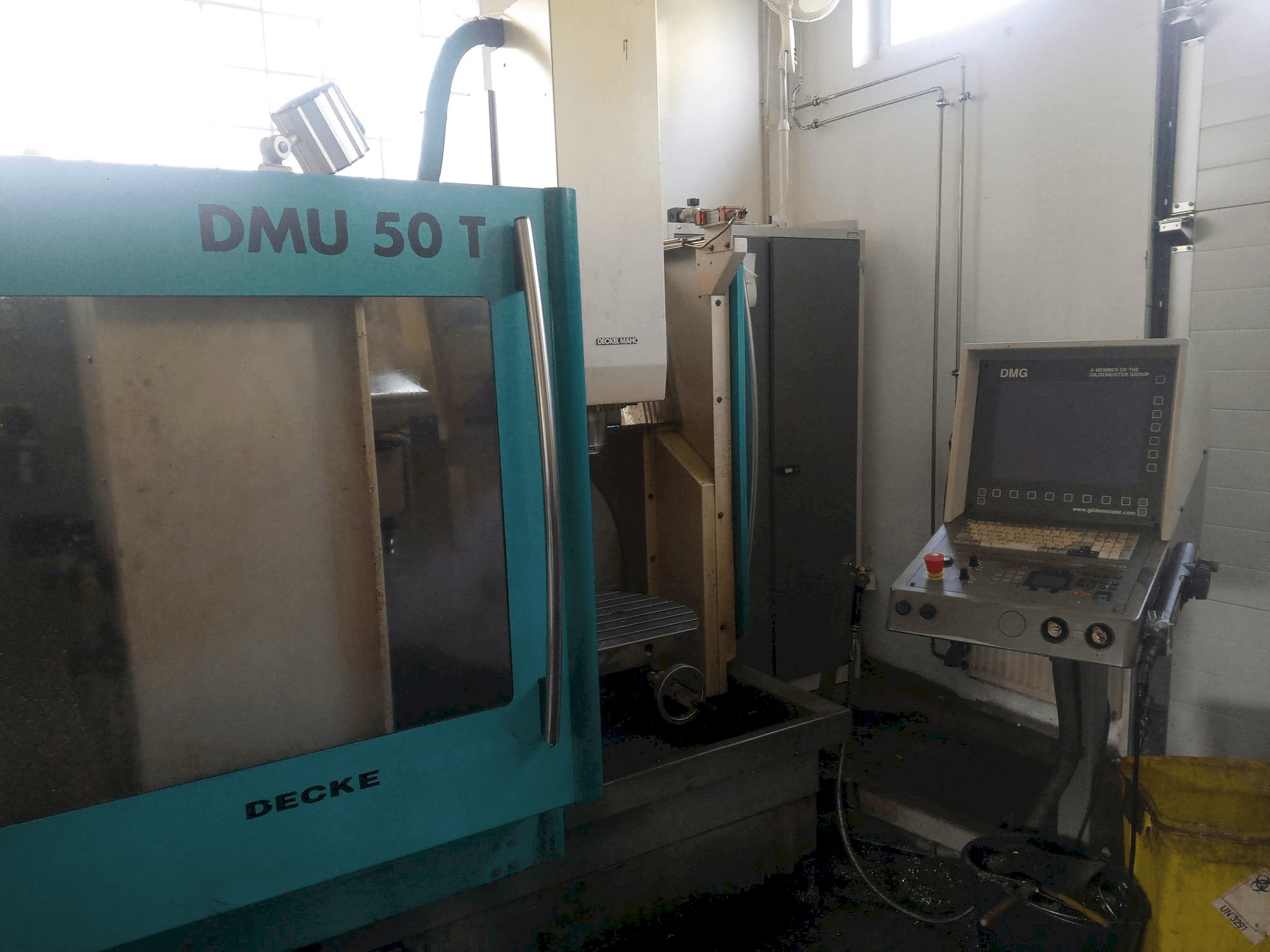 Makine DECKEL MAHO DMU 50 T - Önden görünüm