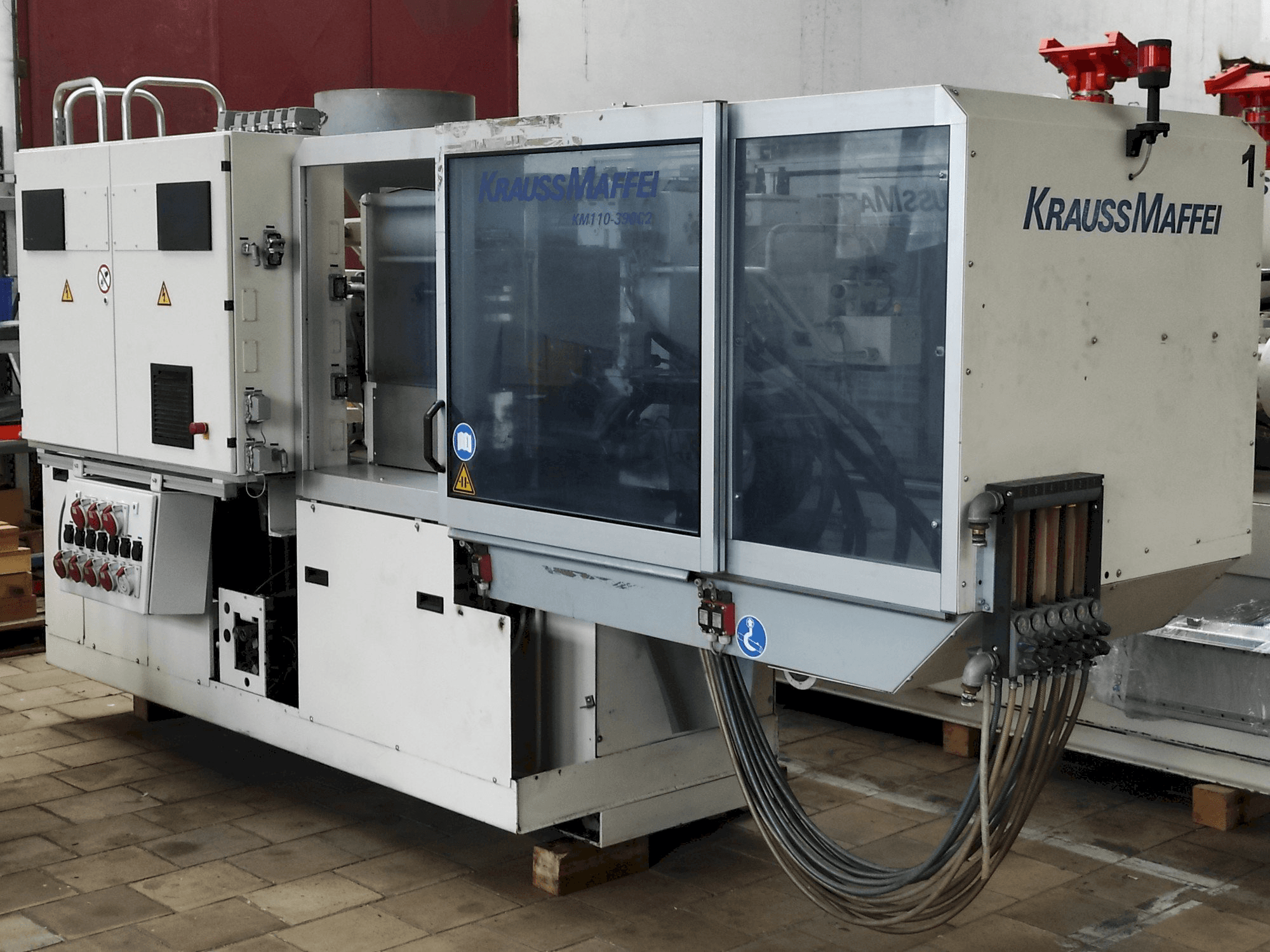 Makine Krauss Maffei 110 - 390 C2 - Önden görünüm