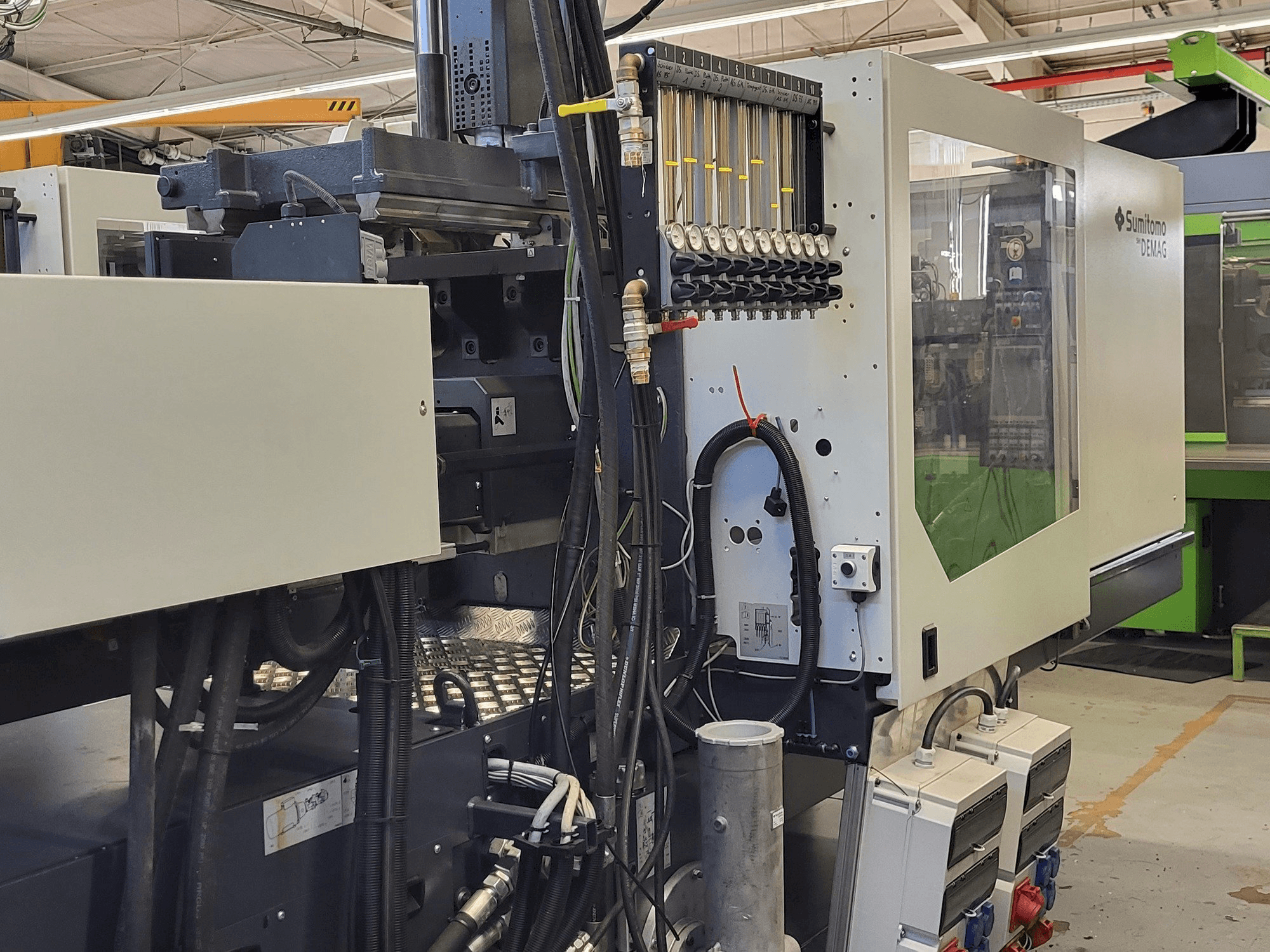 Makine Sumitomo SHI DEMAG Systec Multi 120/470-200h/80V - Sol taraftaki görüntü