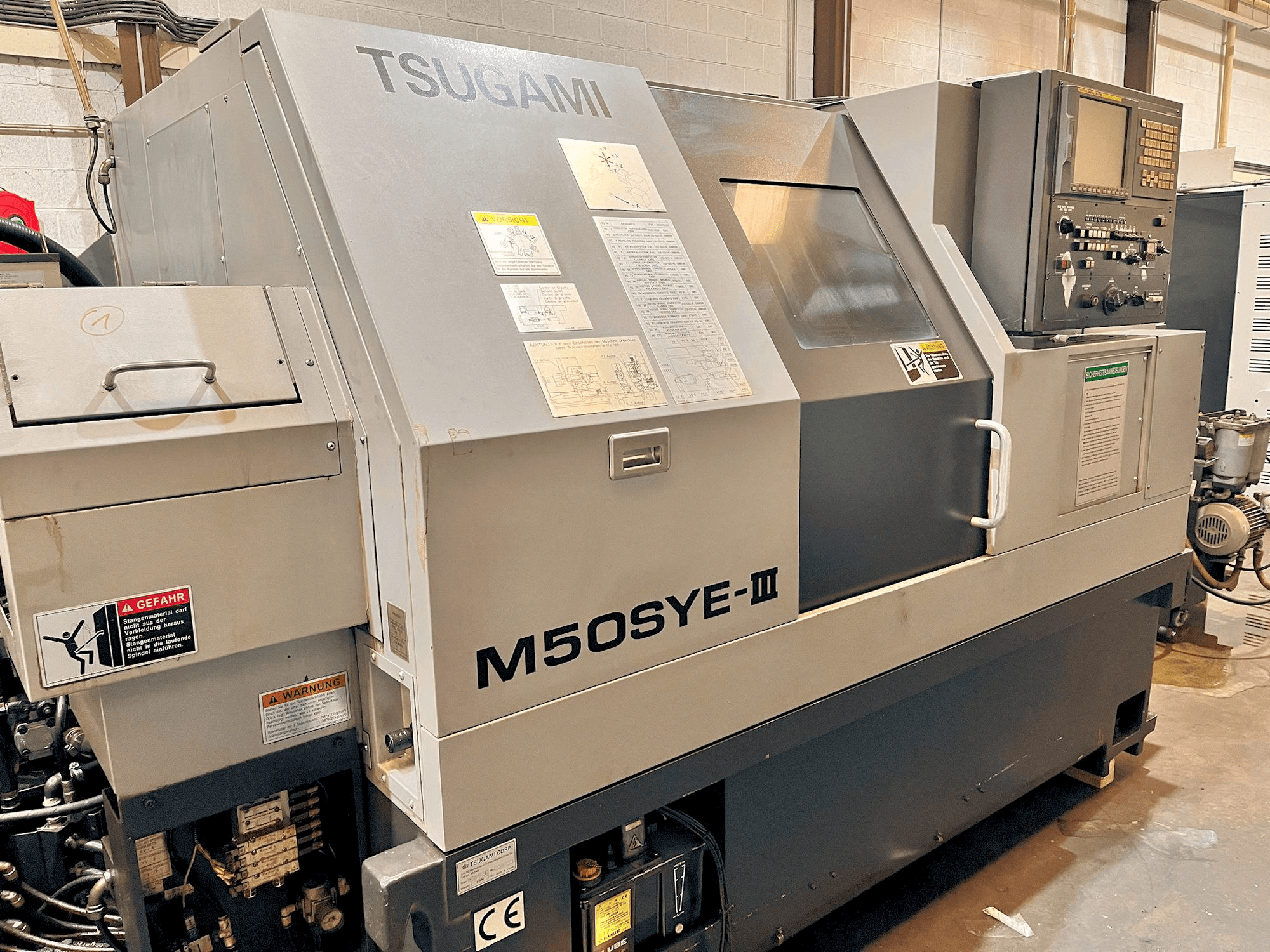 Makine TSUGAMI M50SYE-III - Önden görünüm