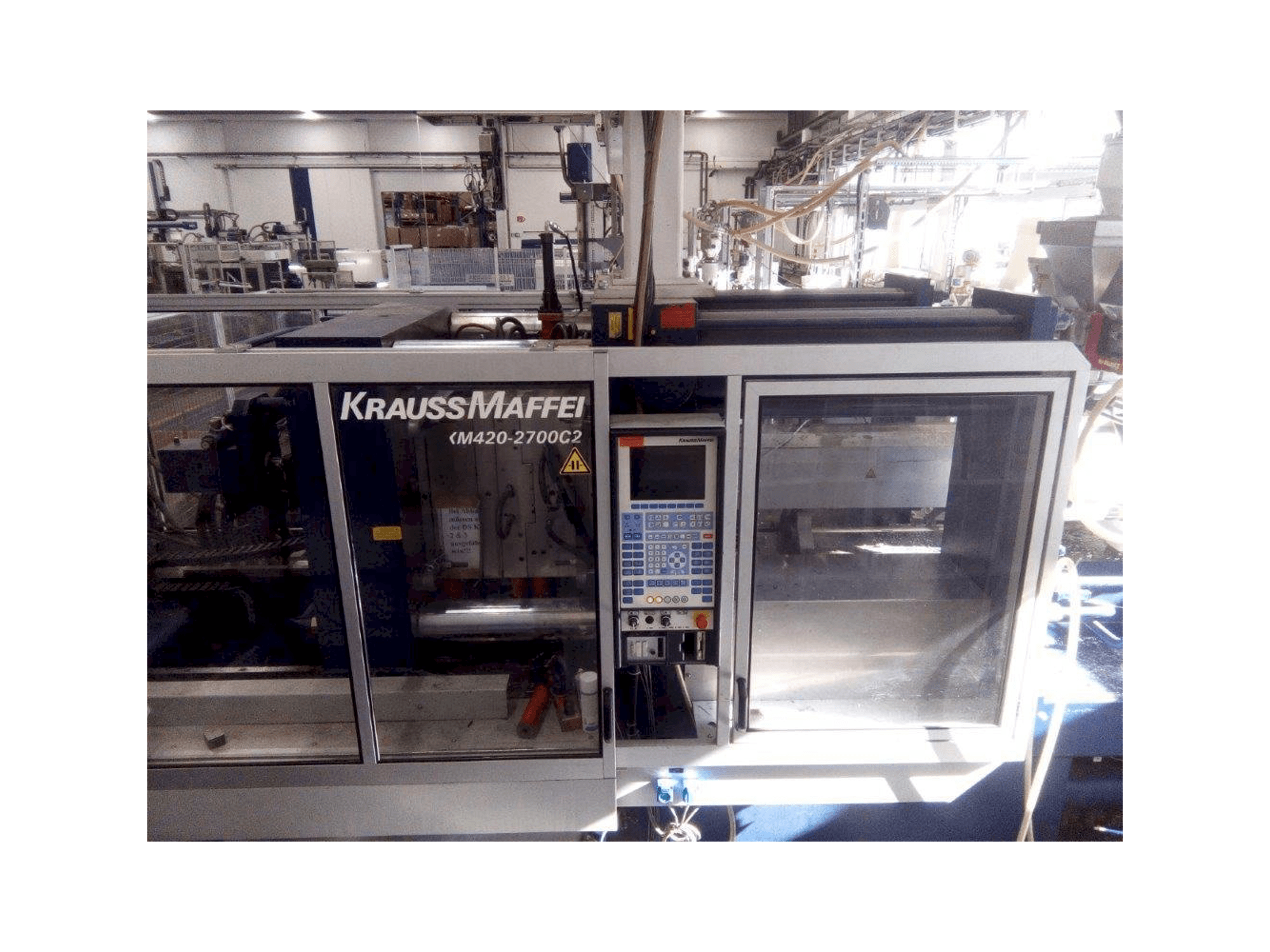 Makine Krauss Maffei KM 420/2700 C2 - Önden görünüm