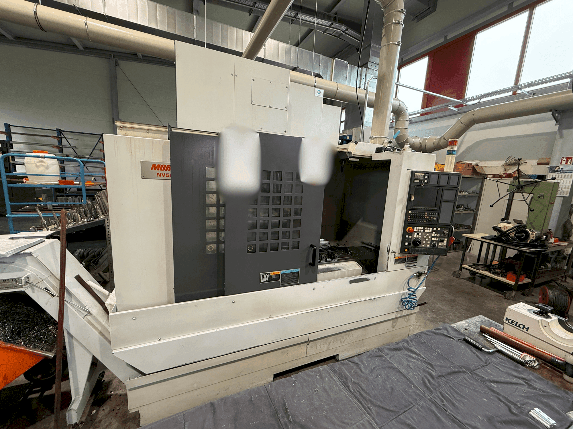 Makine MORI SEIKI NV 5000 a1 B/40 - Önden görünüm