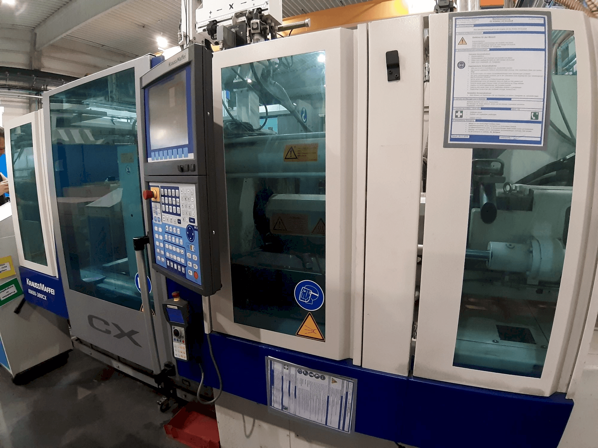 Makine Krauss Maffei 80 - 380 CX - Önden görünüm