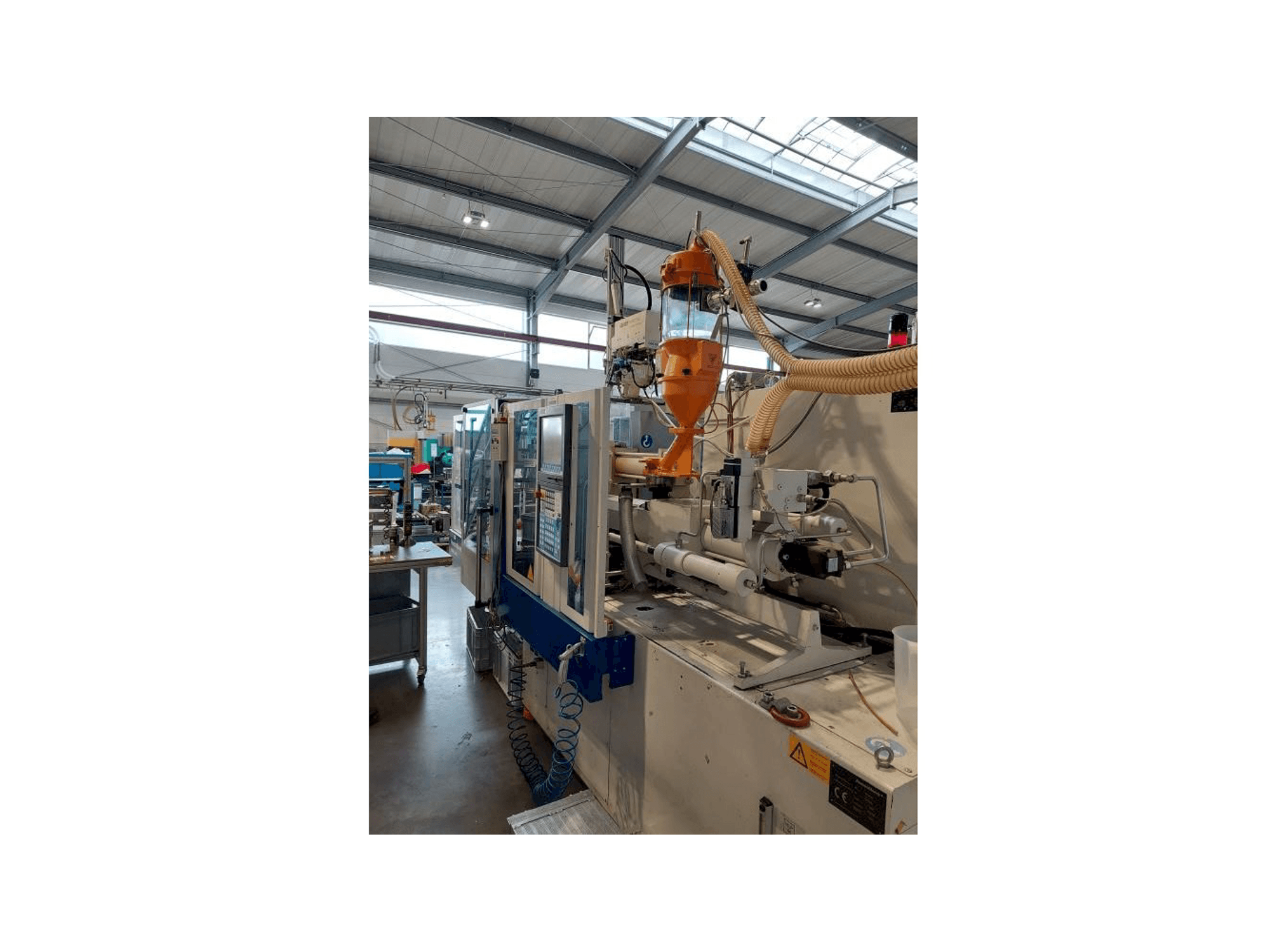 Makine Krauss Maffei 80-180 CX - Önden görünüm