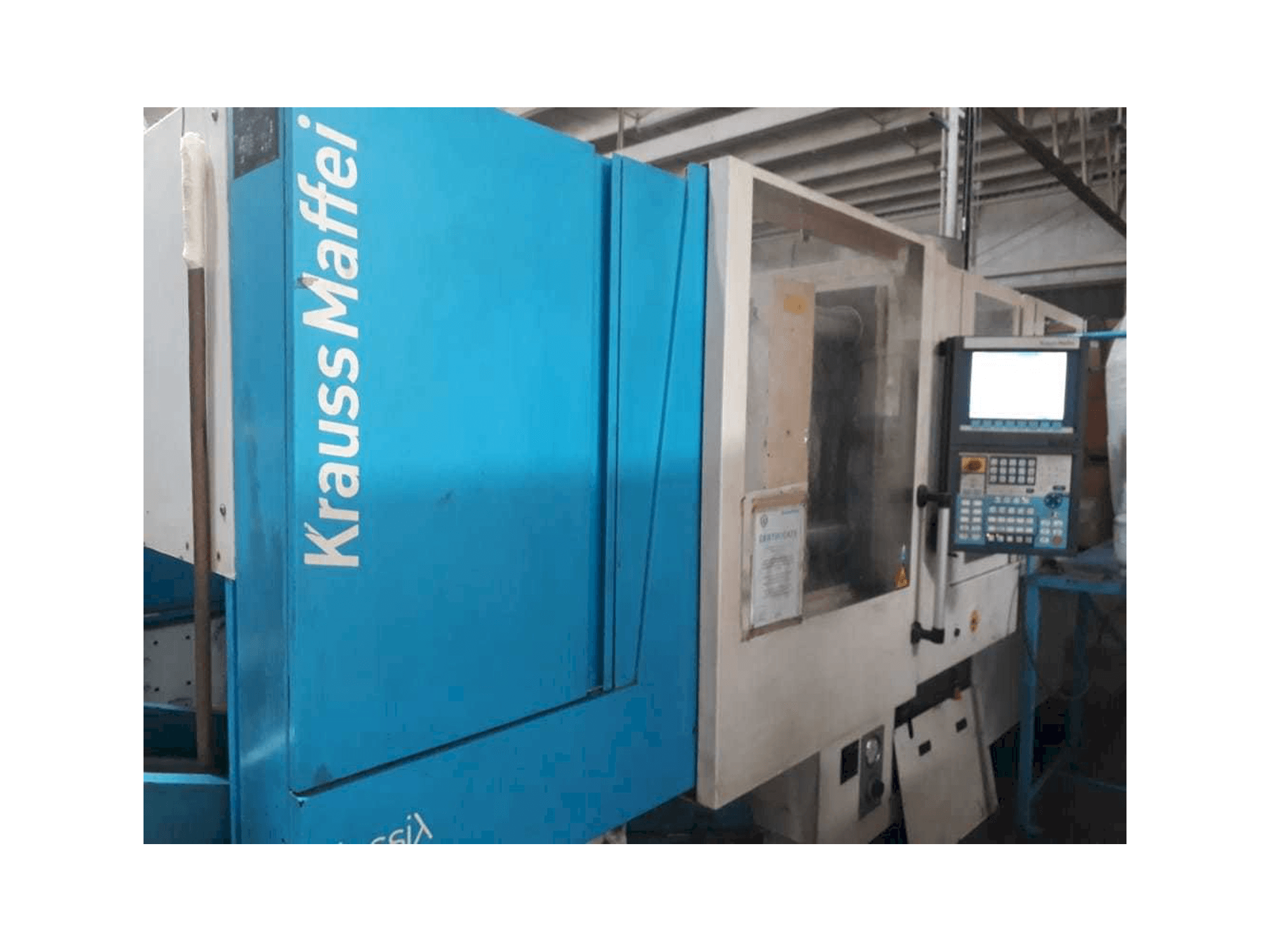 Makine Krauss Maffei 160/750 CX - Önden görünüm