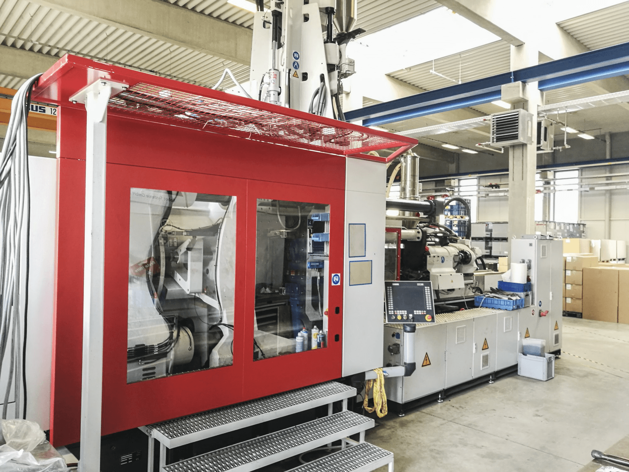 Makine FERROMATIK MILACRON - Sol görünüm MM 800-4880/MSW