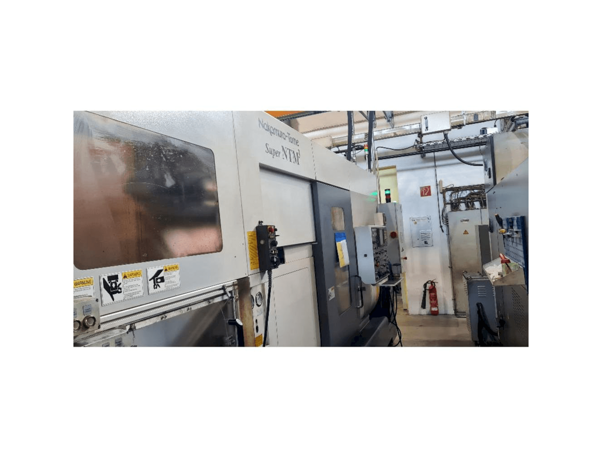 Makine NAKAMURA Super NTM³ - Önden görünüm