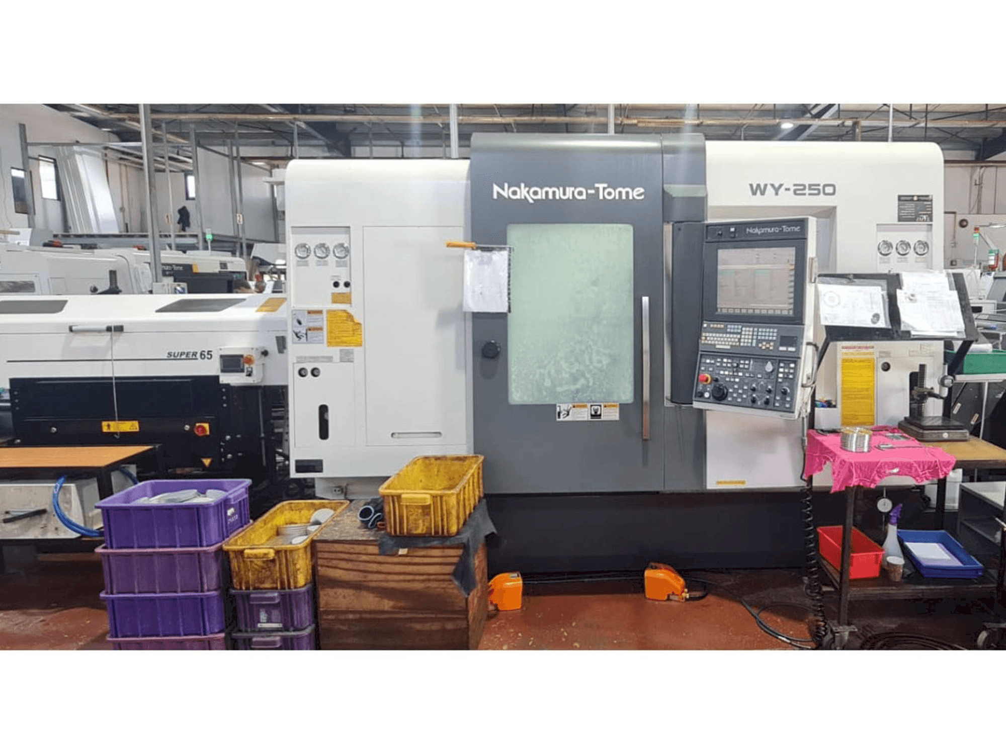 Makine NAKAMURA-TOME WY 250 - Önden görünüm