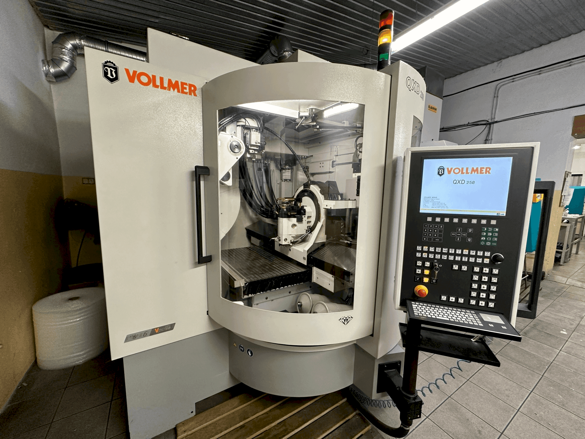 Makine VOLLMER QXD 250 - Önden görünüm