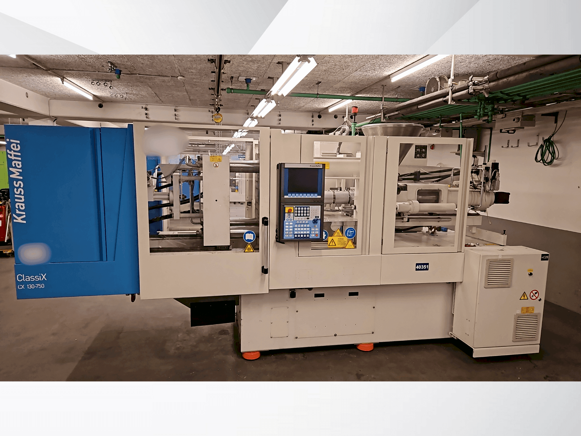 Makine Krauss Maffei 130-750 CX - Önden görünüm