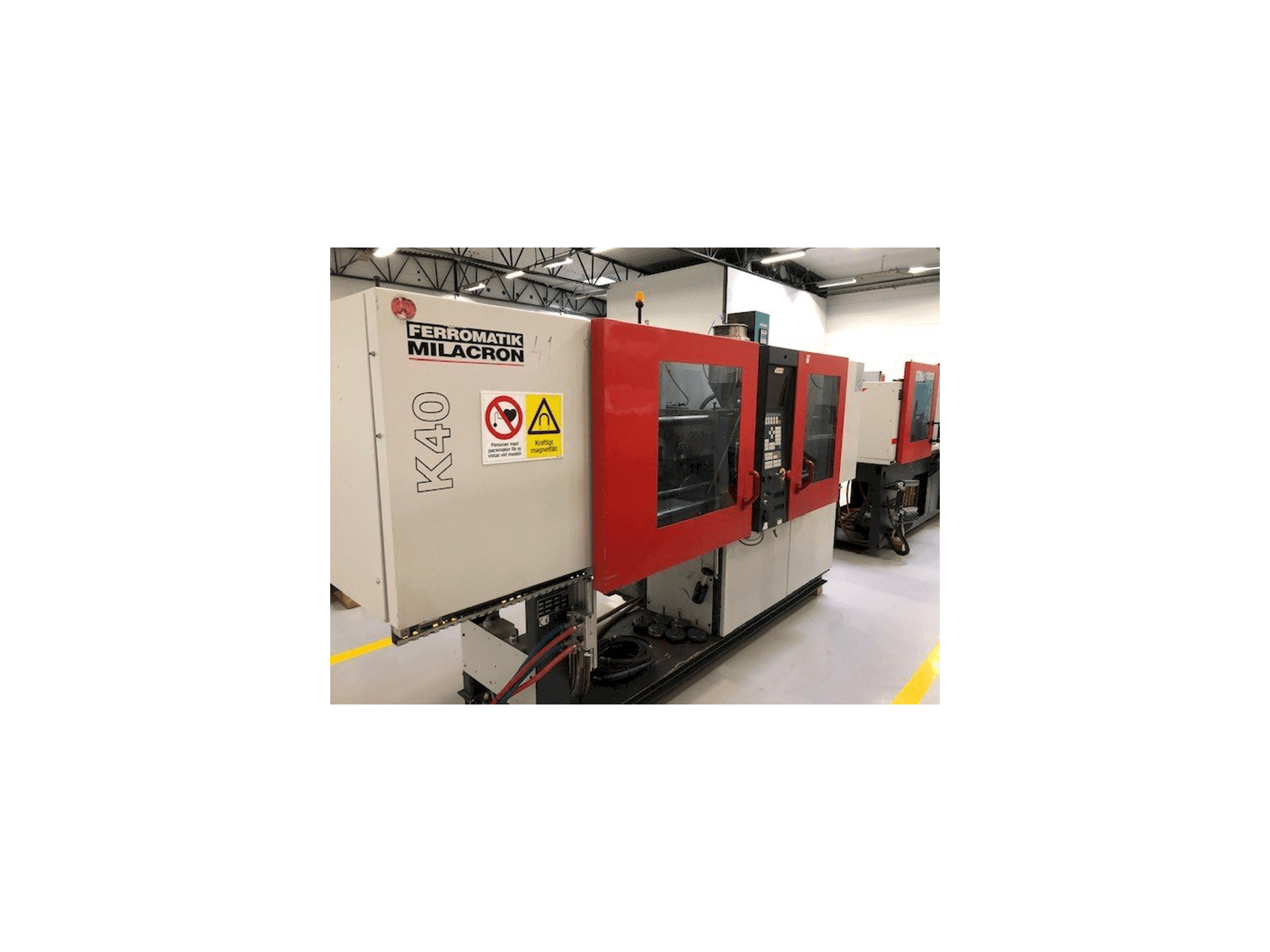 Makine FERROMATIK MILACRON K40 D-E - Sol taraftaki görüntü