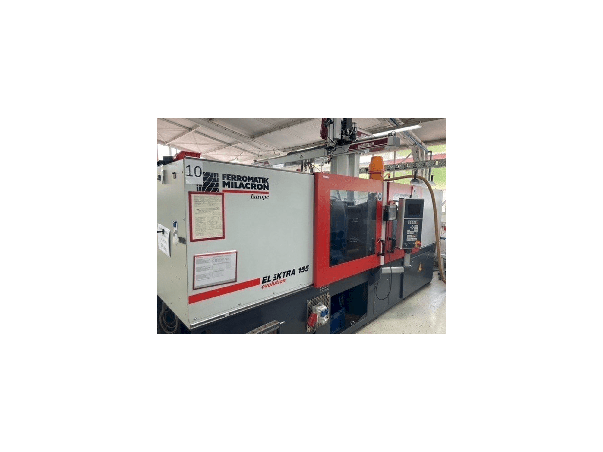 Makine FERROMATIK MILACRON EE 155 - Önden görünüm