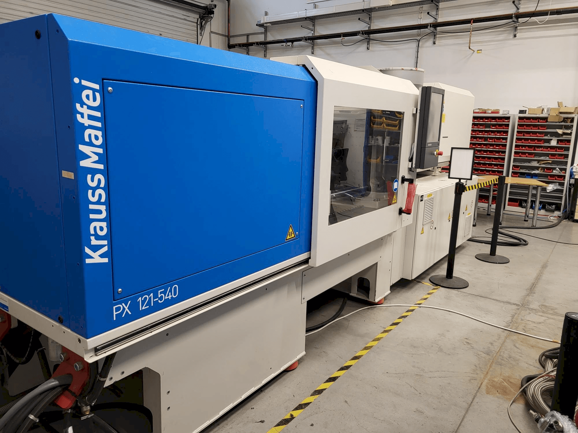Makine Krauss Maffei PX 121-540 - Sol taraftaki görüntü