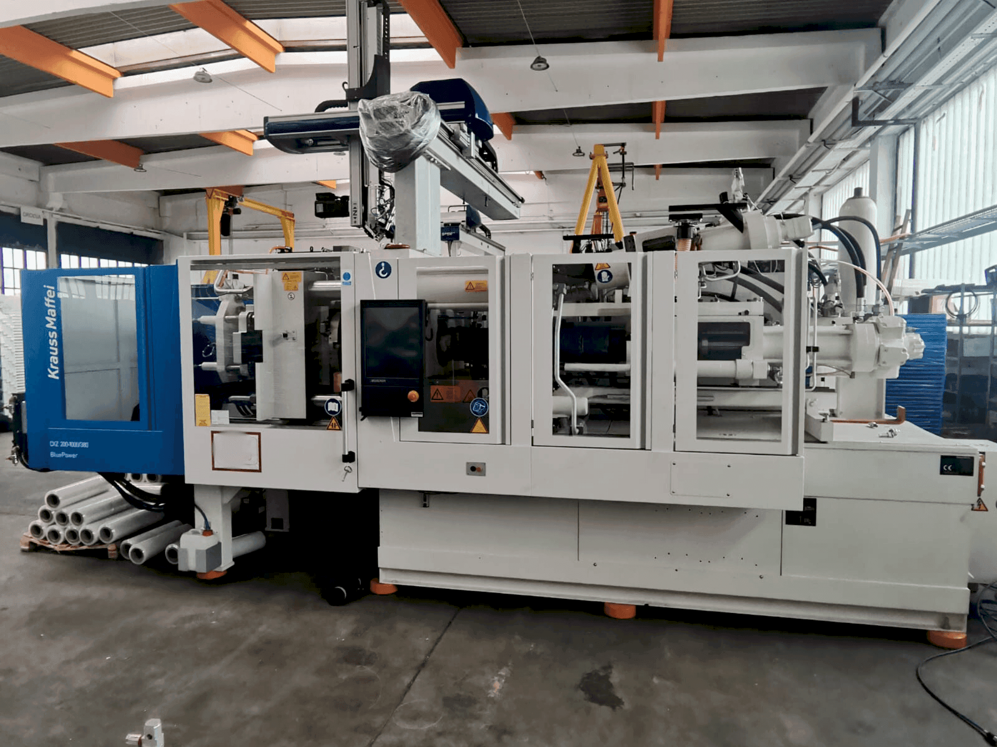 Makine Krauss Maffei 200-1000-380 CX Z - Önden görünüm