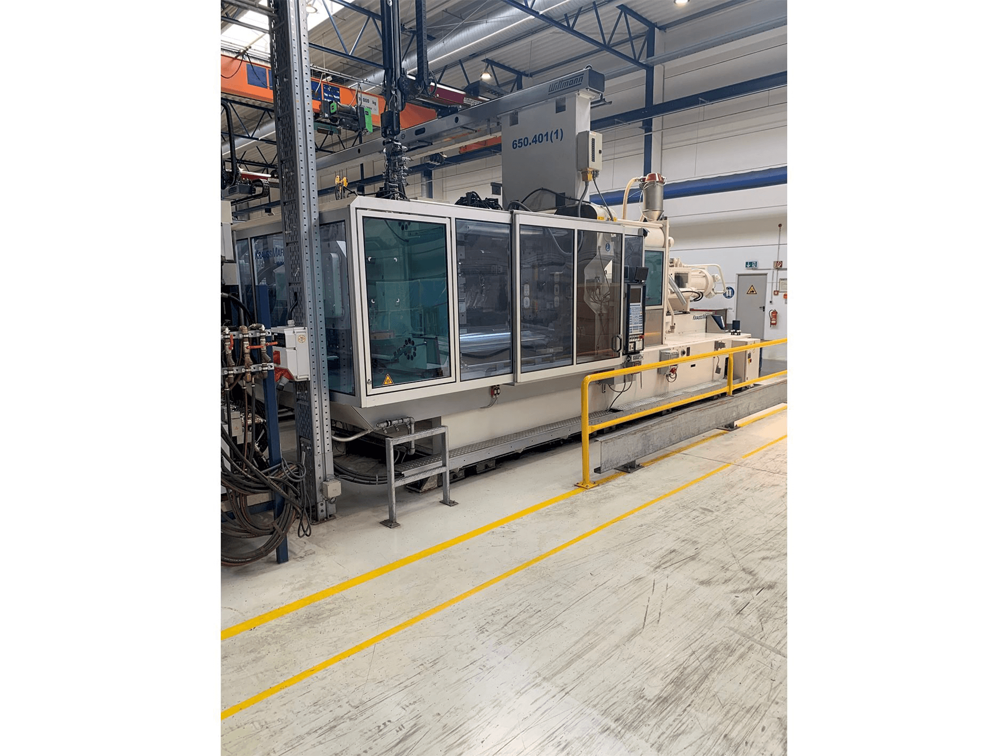 Makine Krauss Maffei 650-2700-520 CL - Önden görünüm