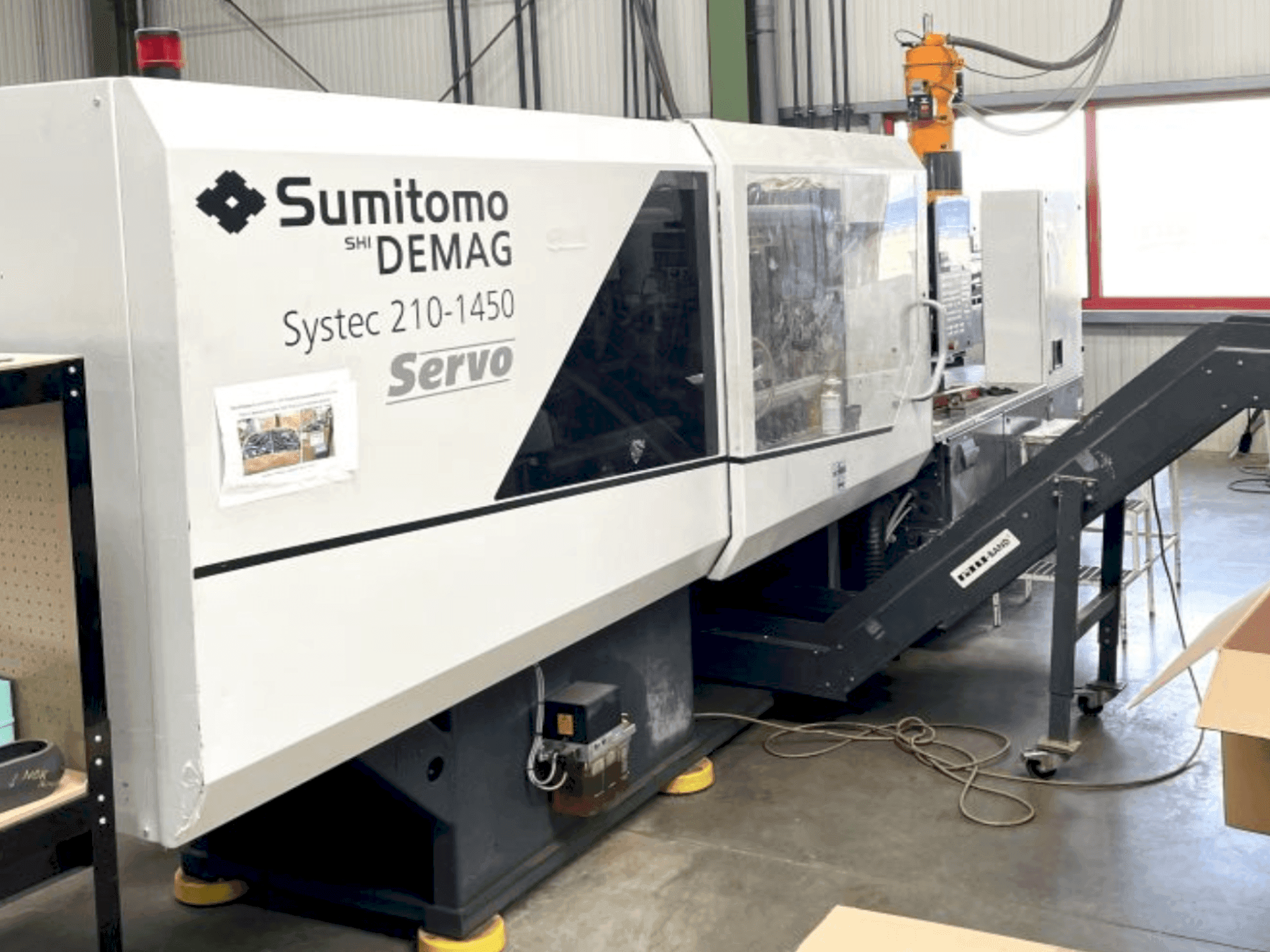 Makine DEMAG System 210-1450 - Önden görünüm