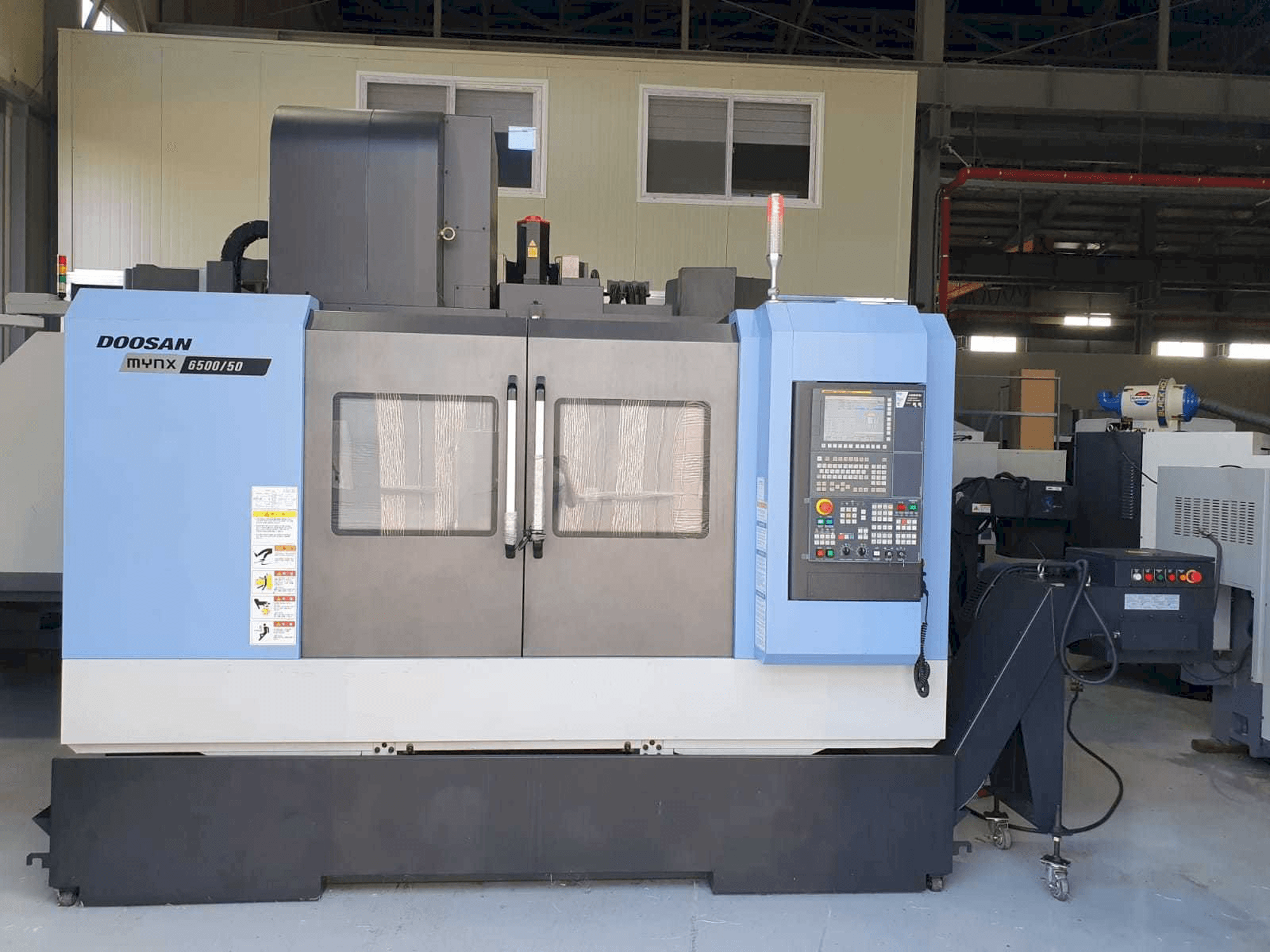 Makine Doosan Mynx 6500/50 - Önden görünüm