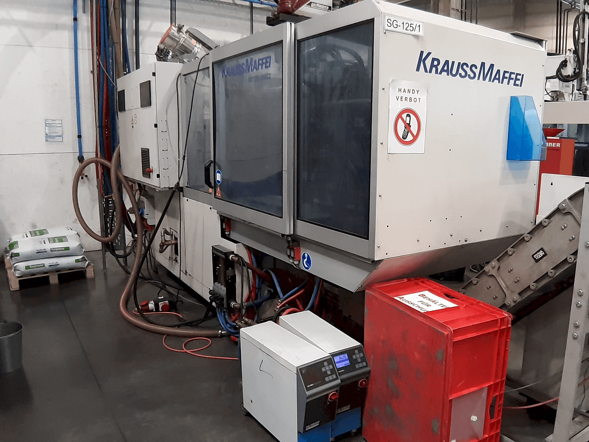 Makine Krauss Maffei 125 - 390 CX - Önden görünüm