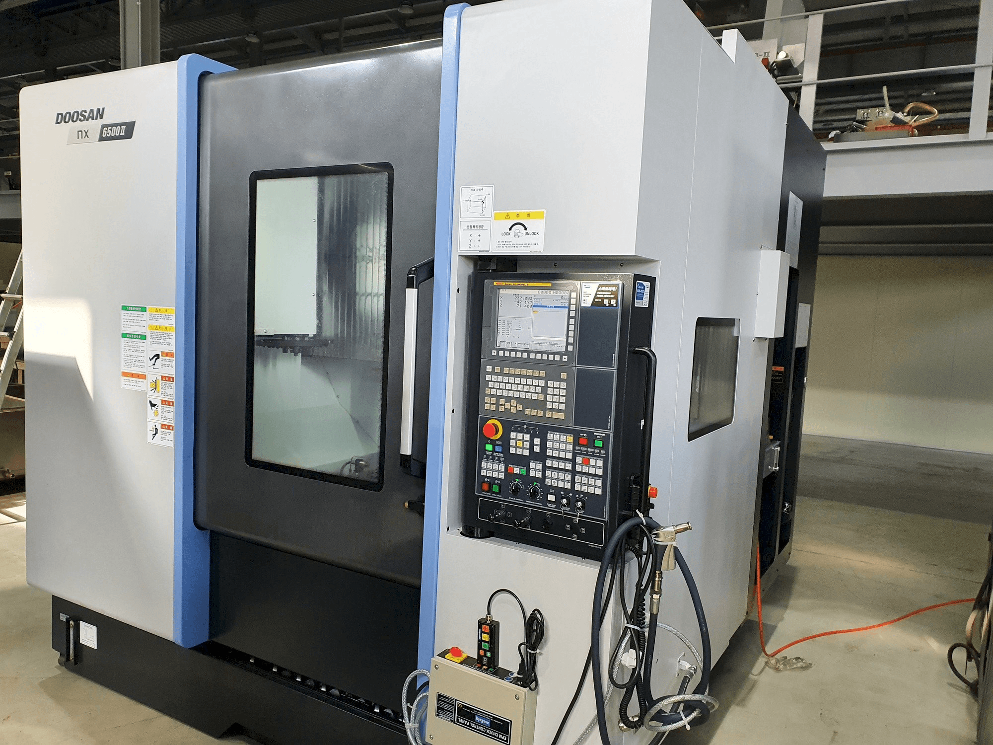 Makine Doosan NX6500Ⅱ - Önden görünüm