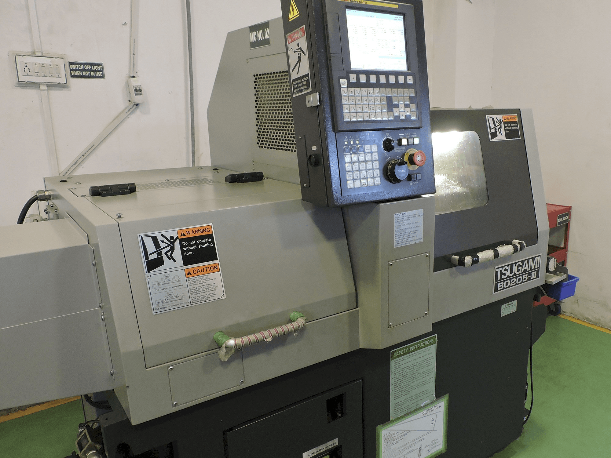 Makine TSUGAMI - Sol görünüm B0205-III