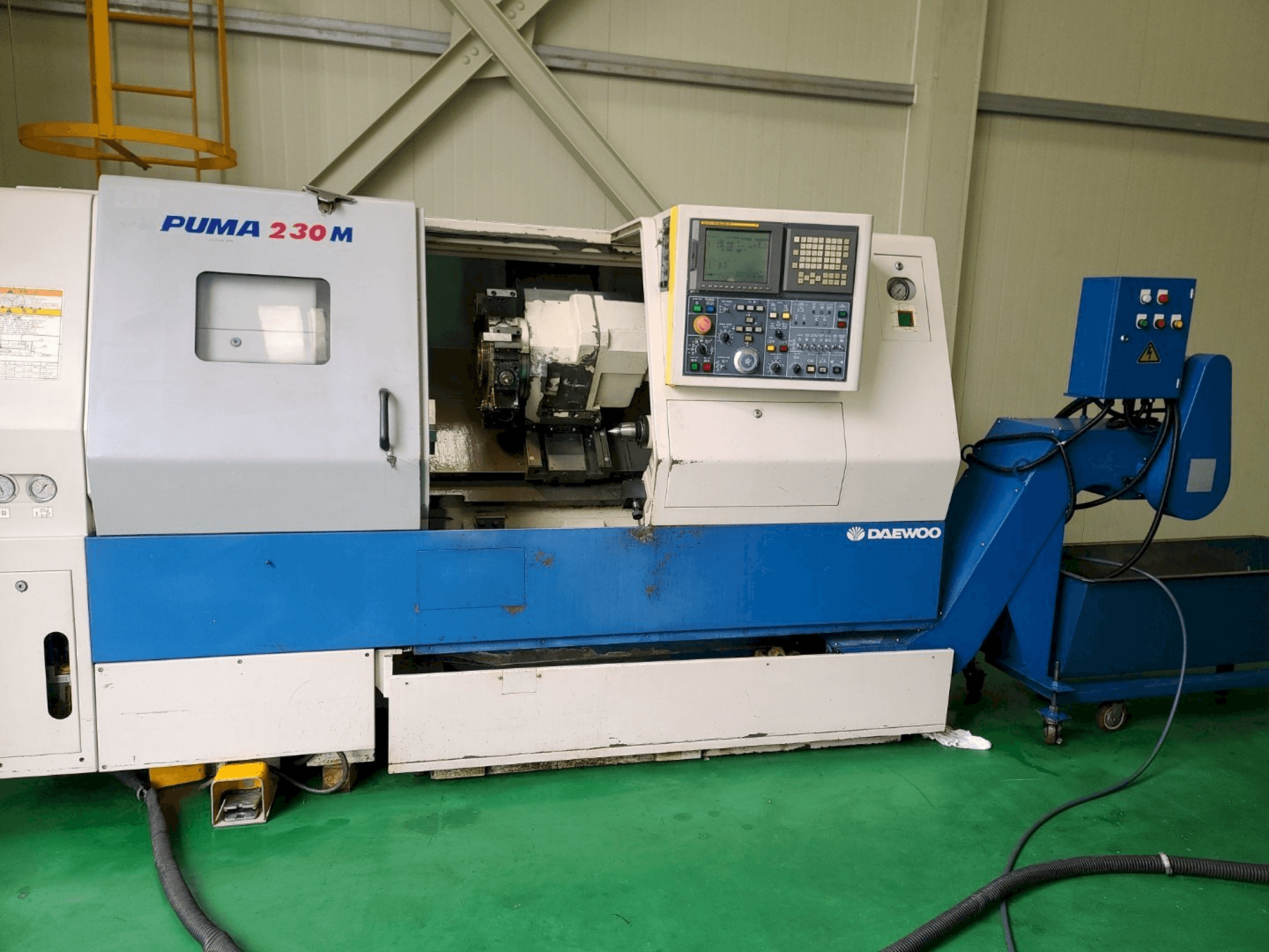 Makine Doosan PUMA 230MB - Önden görünüm