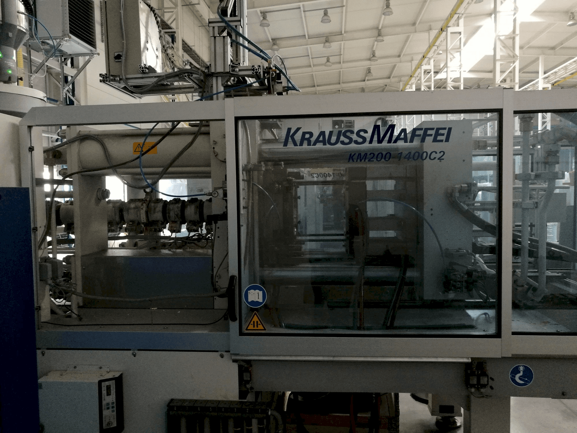 Makine Krauss Maffei 200-1400 C2 - Önden görünüm