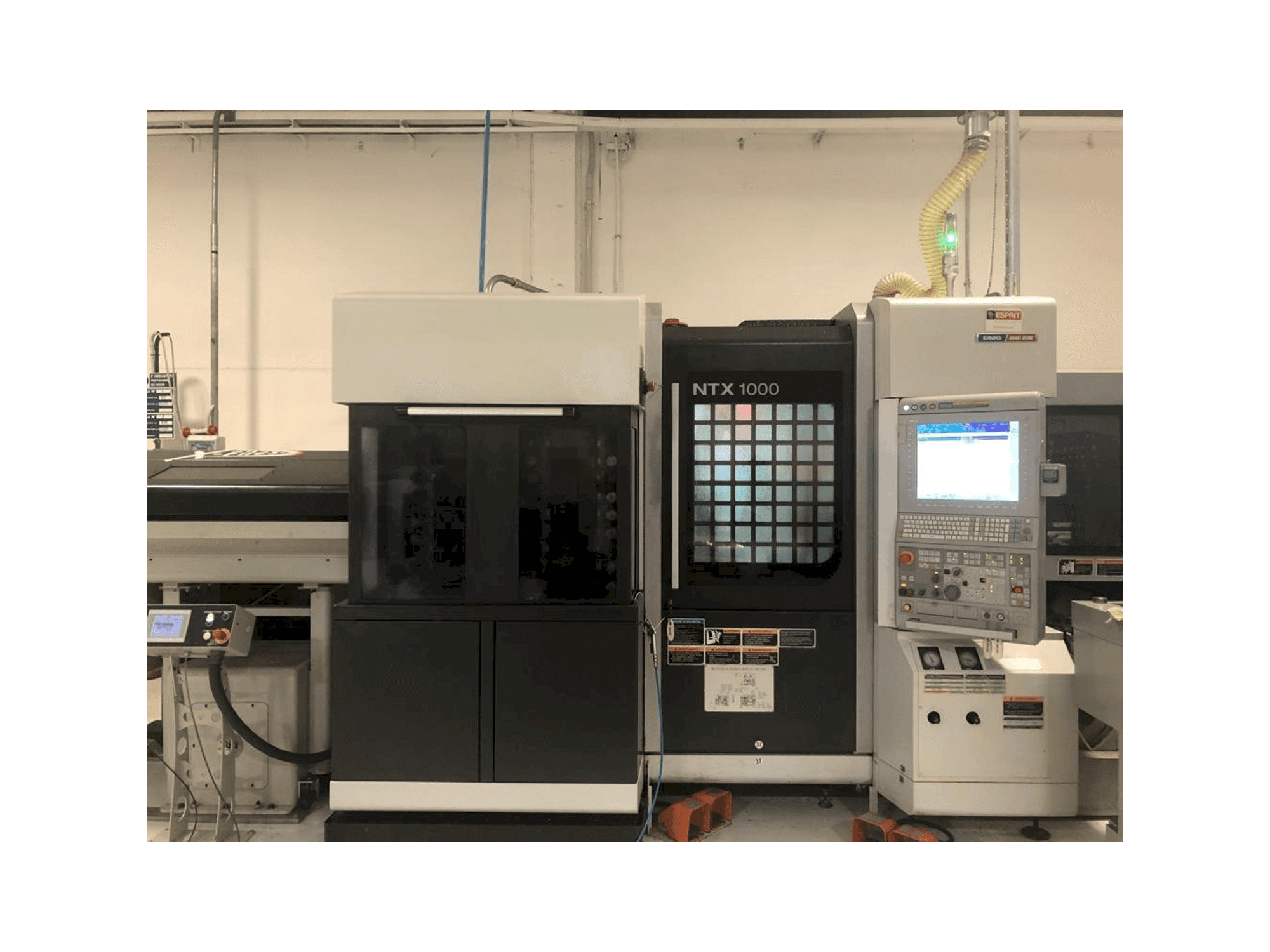 Makine MORI SEIKI NTX1000 - Önden görünüm