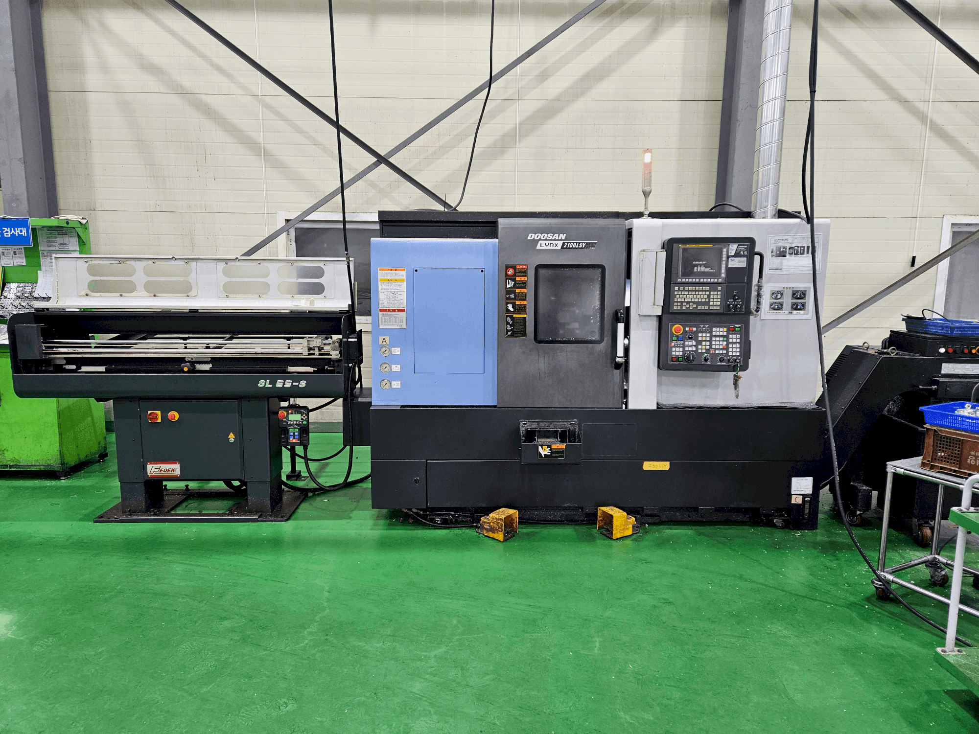 Makine DOOSAN LYNX 2100 LSYB - Önden görünüm