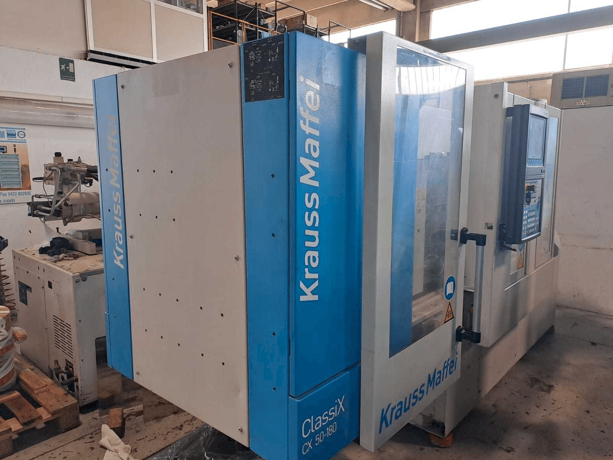Makine Krauss Maffei 50-180CX - Sol görünüm