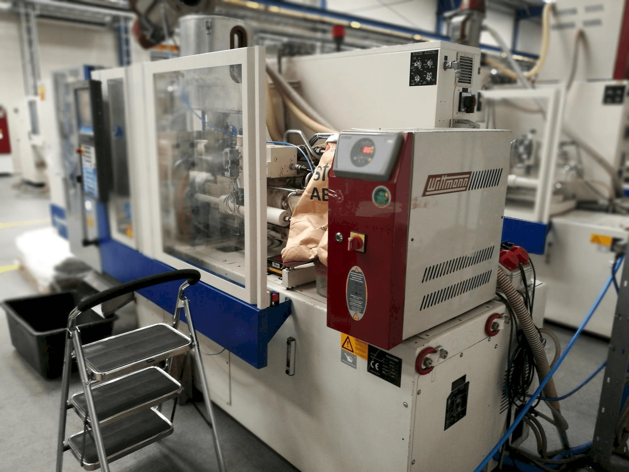 Makine Krauss Maffei KM 35-55 CX - Önden görünüm