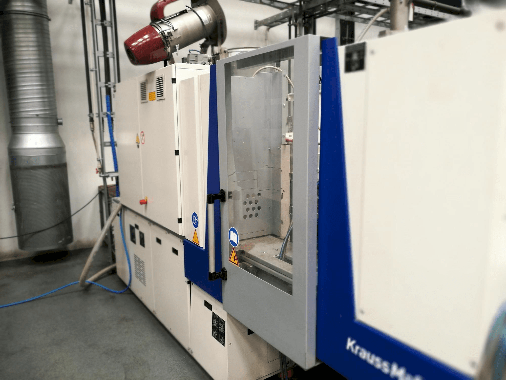 Makine Krauss Maffei KM 35-55 CX - Önden görünüm