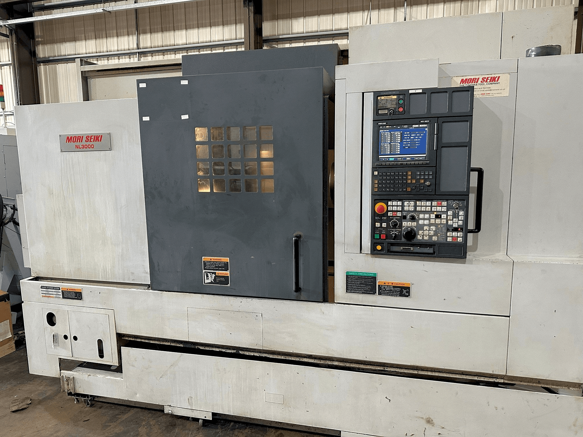 Makine MORI SEIKI NL3000Y/700 - Önden görünüm